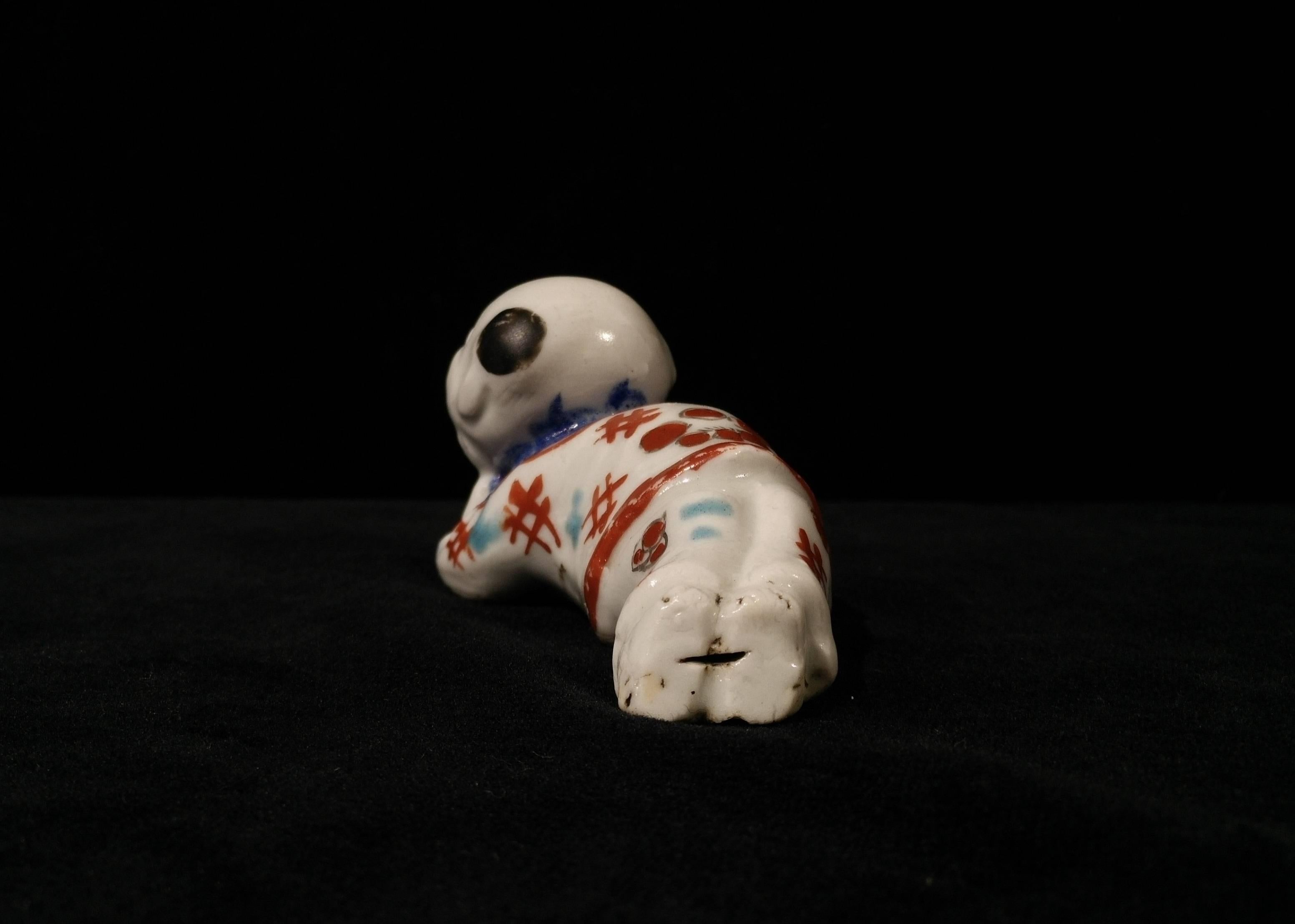 17th Century Japanese Early Kakiemon Porcelain Small Boy Shaped Whistle For Sale 2