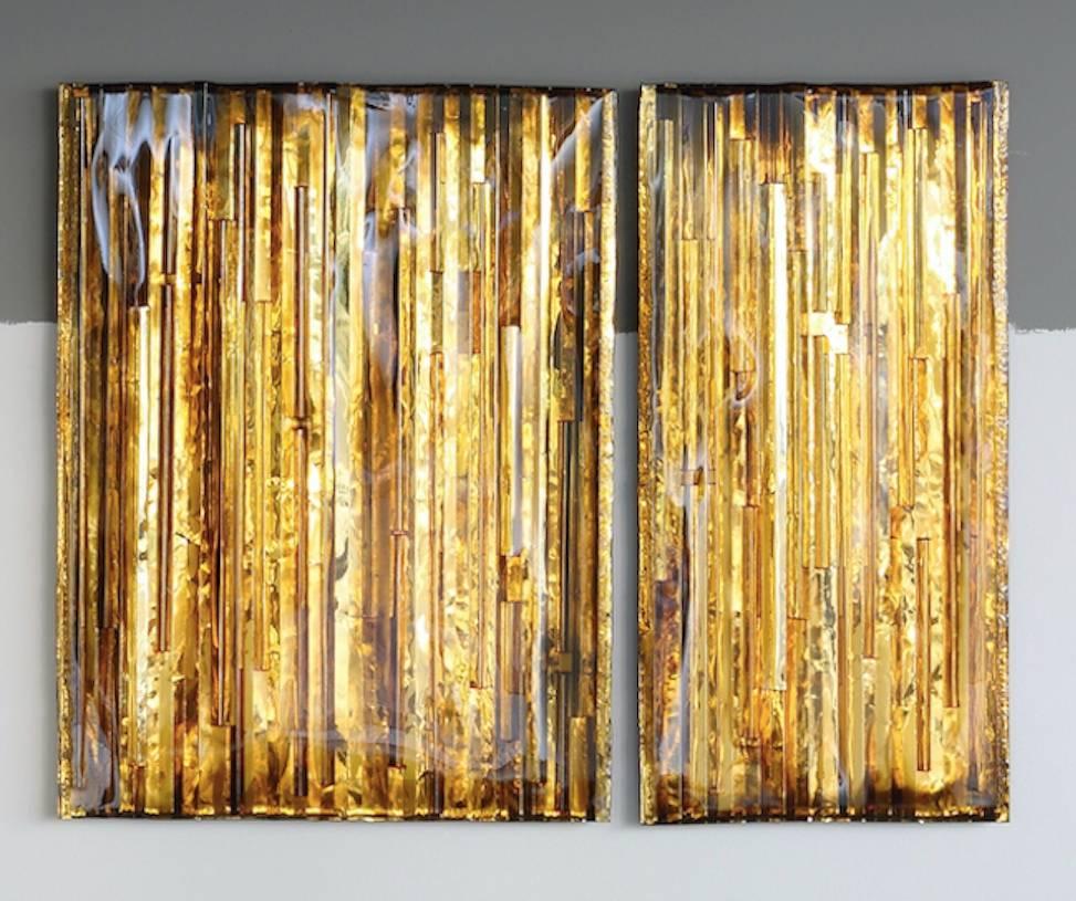 Gold colored wall art consisting of two items. This magnificent decorative wall art is created by emerging artist Pleunie Buyink. This item comes with a “Certificate of Authenticity” issued by the artist.

Pleunie Buyink is a graduate from the