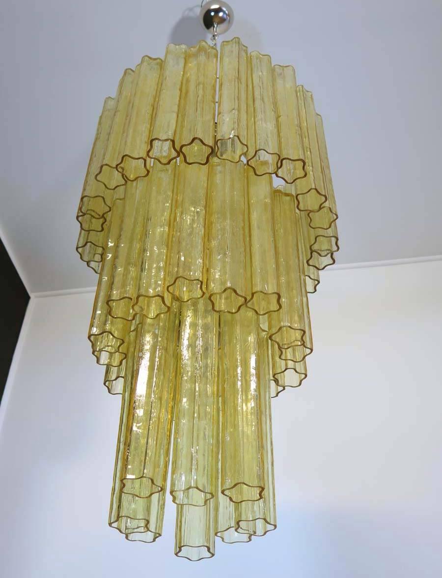 Italian vintage chandelier in Murano glass and nickel-plated metal structure. The polished nikel armature supports 48 large amber glass tubes; it comes complete with chrome chain and ceiling canopy.
Period: 1960s-1970s
Dimensions: 74.80 inches