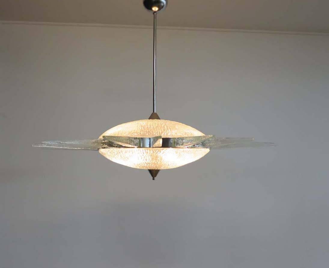 Italian pendant Sputnik chandelier in a nickel frame, clear Murano glass (18 elements). Murano blown glass in a traditional way.
Period: late 20th century
Dimensions: 35.45 inches (90 cm) x height 43.30 inches (110 cm) diameter.
Dimension