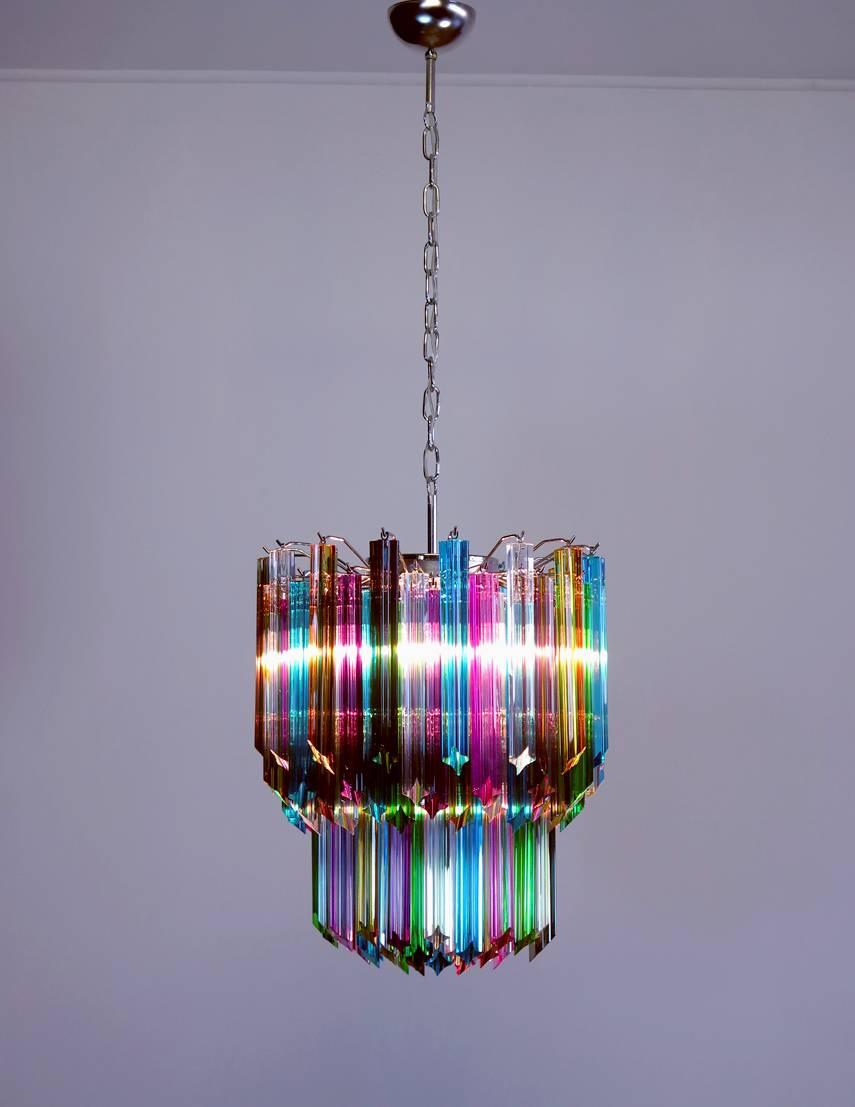 Fantastic and big Murano chandelier made by 107 Murano crystal multicolored prism in a nickel metal frame.
Period: Late 20th century
Dimensions: 51.20 inches height (130 cm) with chain; 25.60 inches height (65 cm) without chain; 18.50 inches