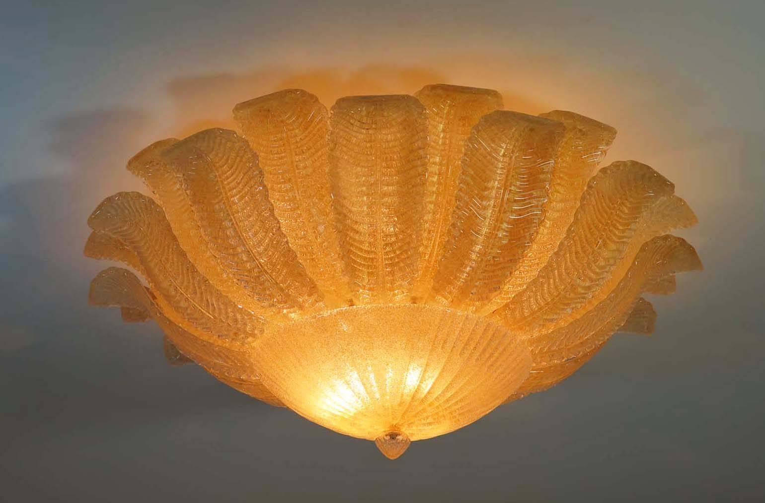 Fantastic and fabulous of vintage Barovier and Toso Murano Italy art glass ceiling light. The rare lamp is made of 24 mouth-blown hand-formed leaf-form golden powder glass panels plus a huge glass as a bottom. This beauty has the look of a precious