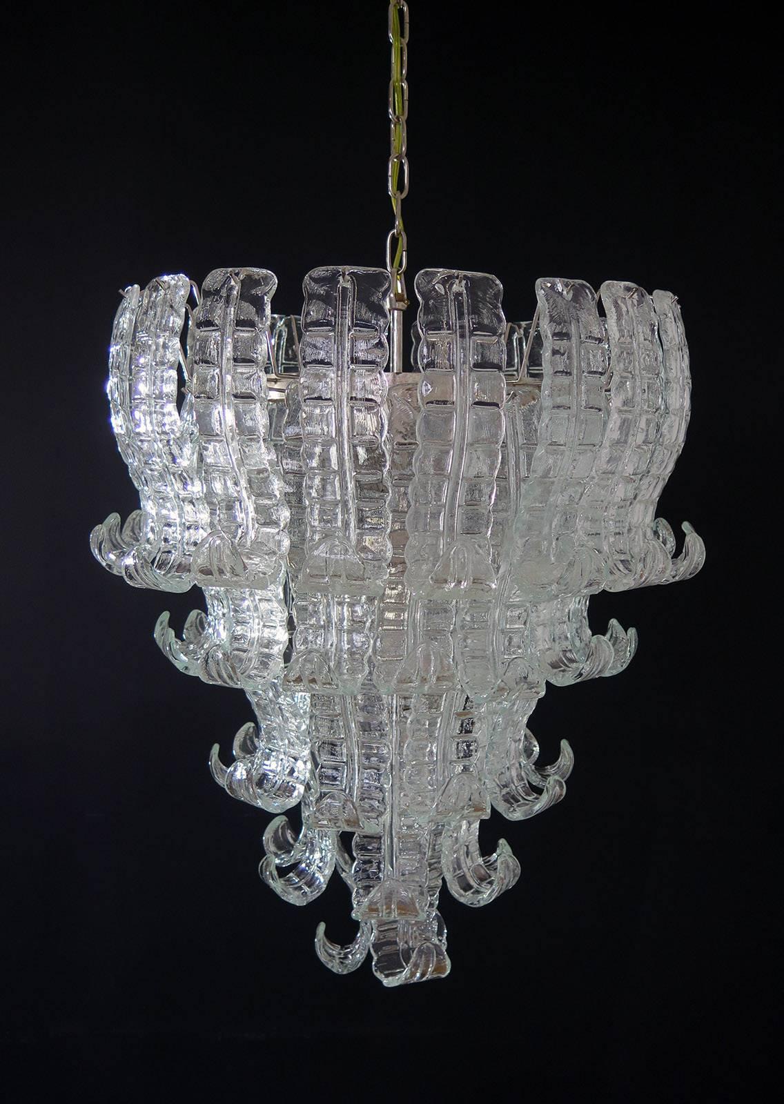 Beautiful and huge Italian Murano chandelier composed of 52 splendid trasparent glasses that give a very elegant look
Period: 1970s
Dimensions: 55.10 inches (140 cm) height with chain; 31.50 inches (80 cm) height without chain; 27.55 inches (70