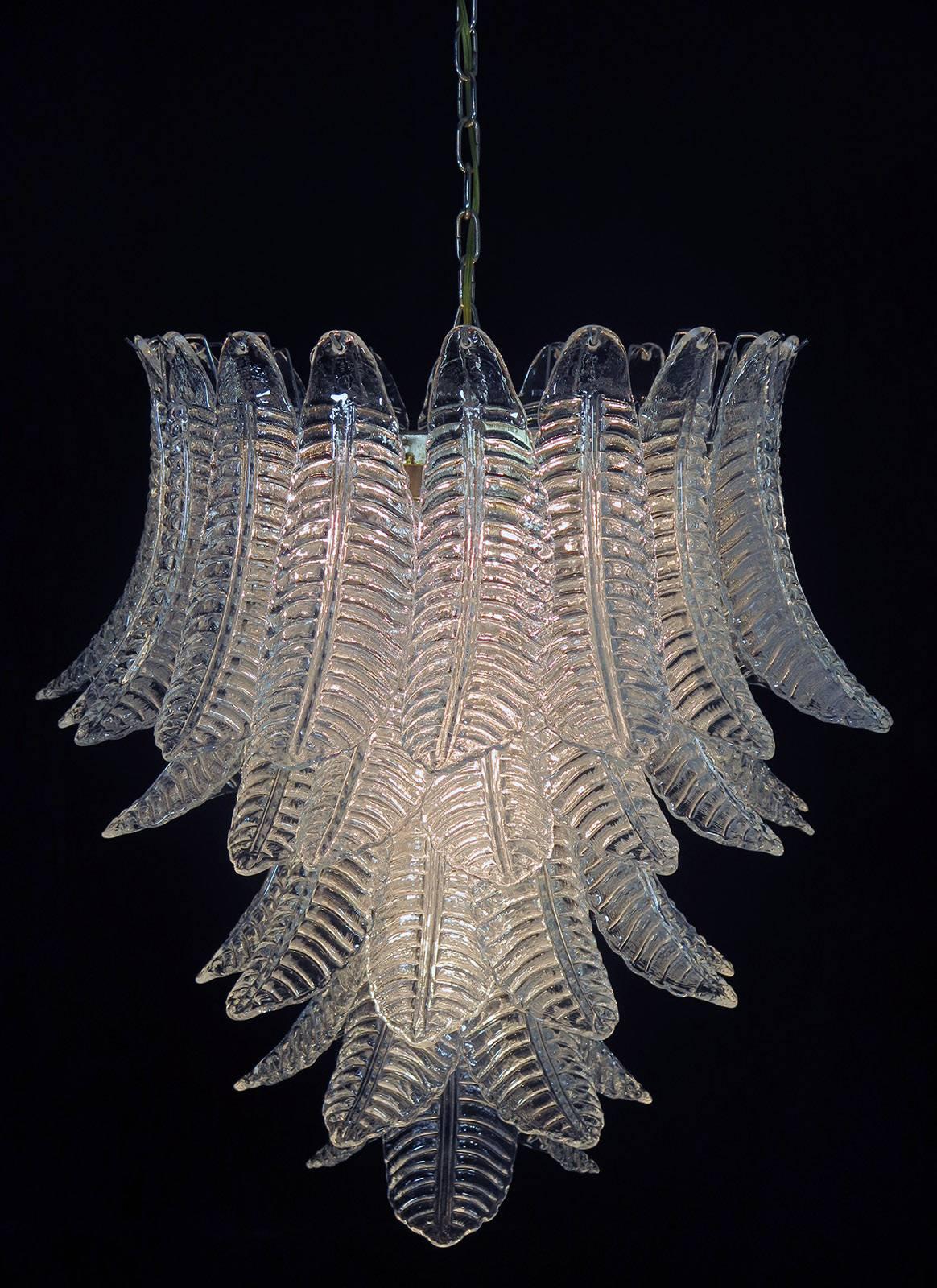 Beautiful and huge Italian Murano chandelier composed of 52 splendid transparent glasses that give a very elegant look. The glasses of this chandelier are real works of art, the weight of this chandelier is 45 kg.

Period: 1970s

Dimensions: 61