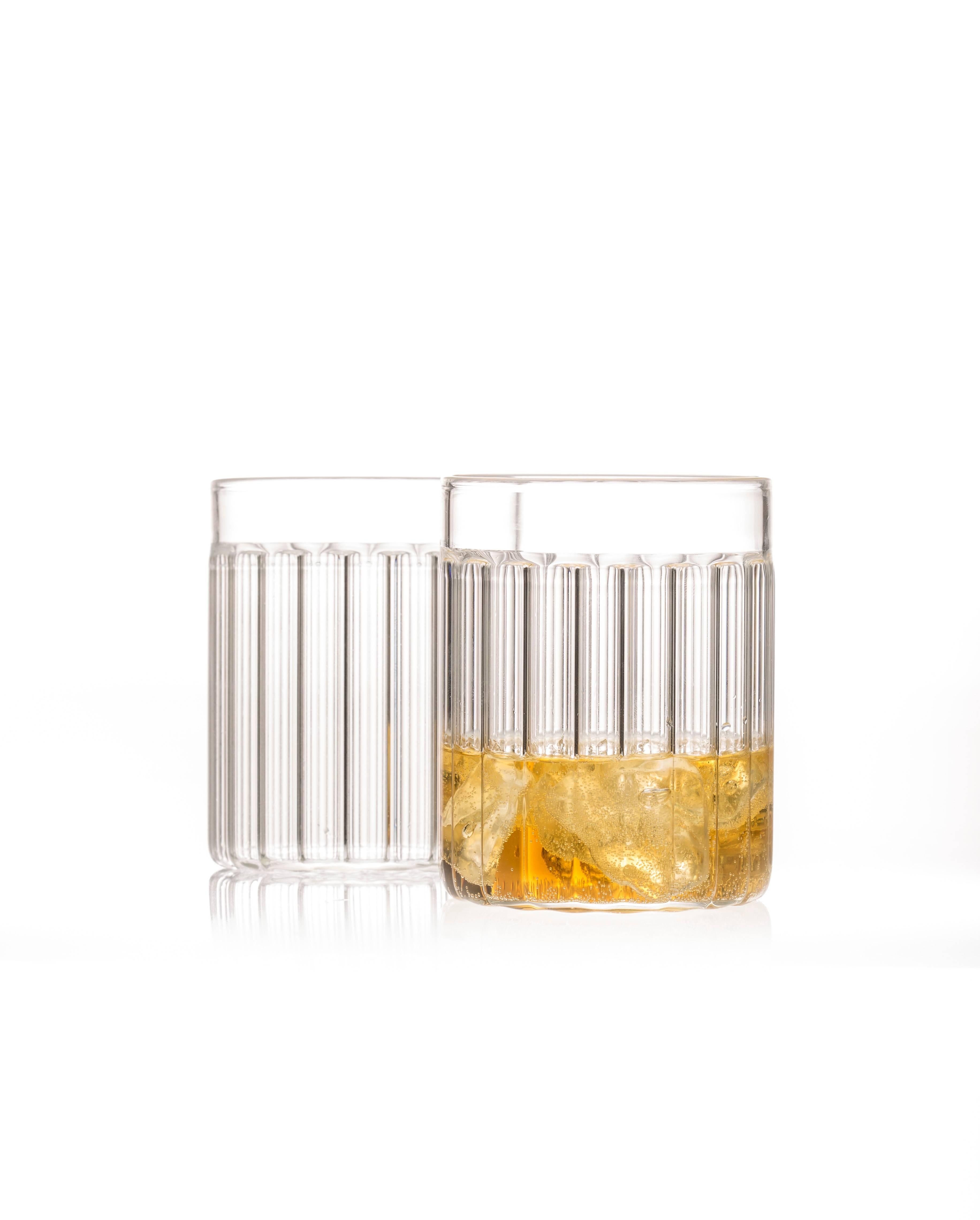 This Czech contemporary clear glass set includes six Bessho Collins glasses and six Bessho Tumblers 

Just as the small town is known for the healing properties of its hot springs, so are the evenings we spend with good friends. The contemporary,
