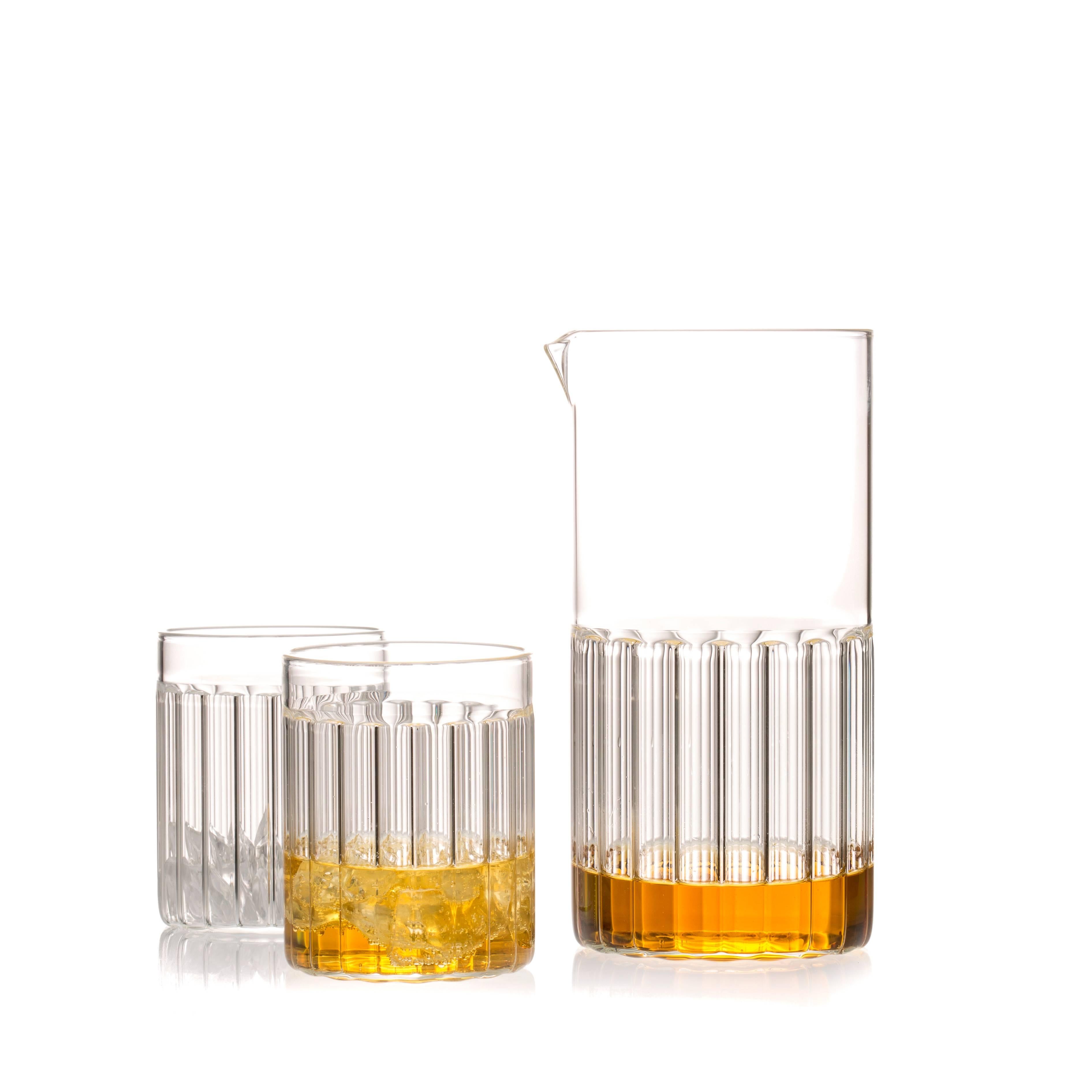 This contemporary Czech glass set includes one Bessho Carafe Pitcher and six Bessho Tumblers 

Just as the small town is known for the healing properties of its hot springs, so are the evenings we spend with good friends. The contemporary, minimal