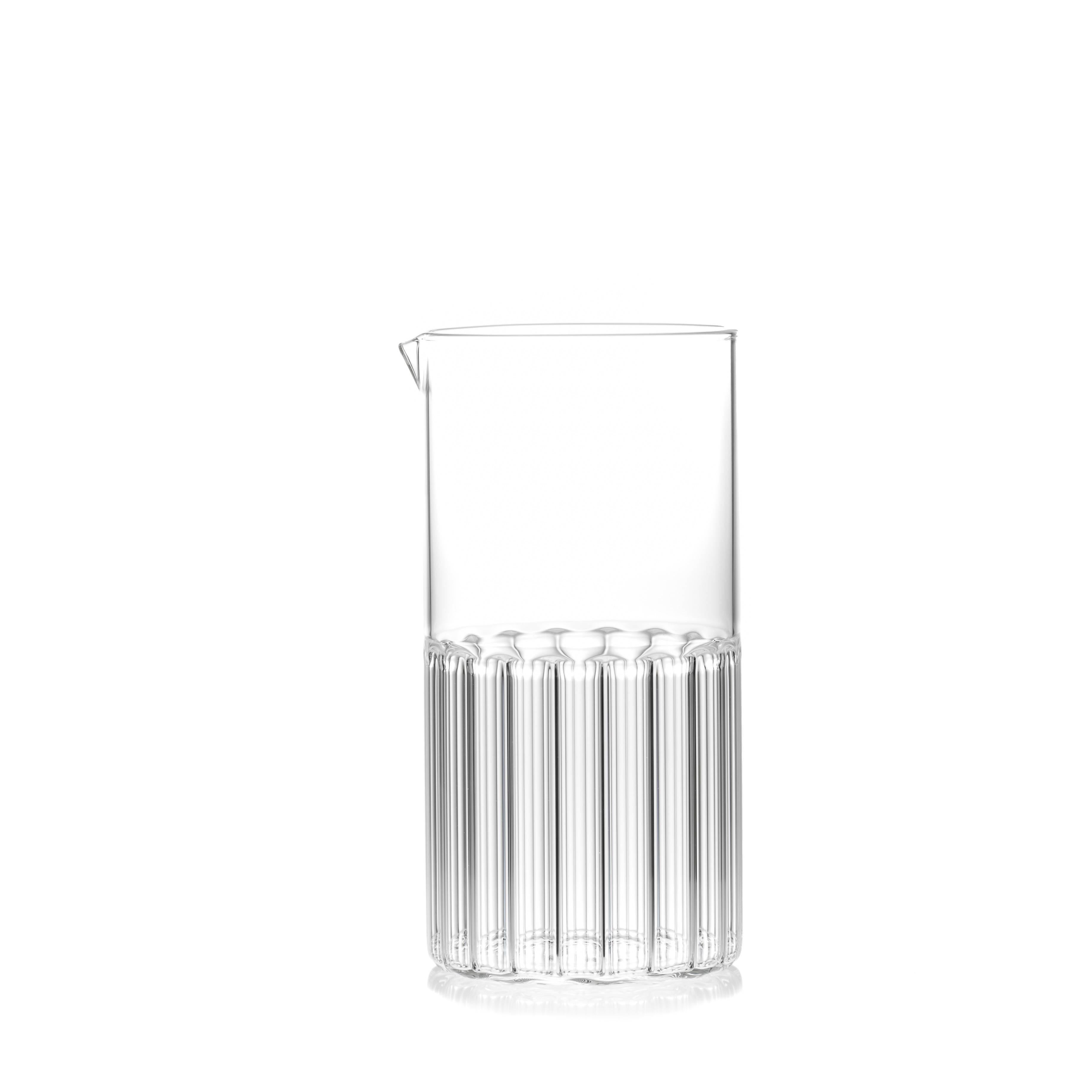 This contemporary clear glassware set includes 1 Bessho Carafe and 6 Rila Large Glasses. Each pieces is handmade in the Czech Republic.

Just as the small town is known for the healing properties of its hot springs, so are the evenings we spend with