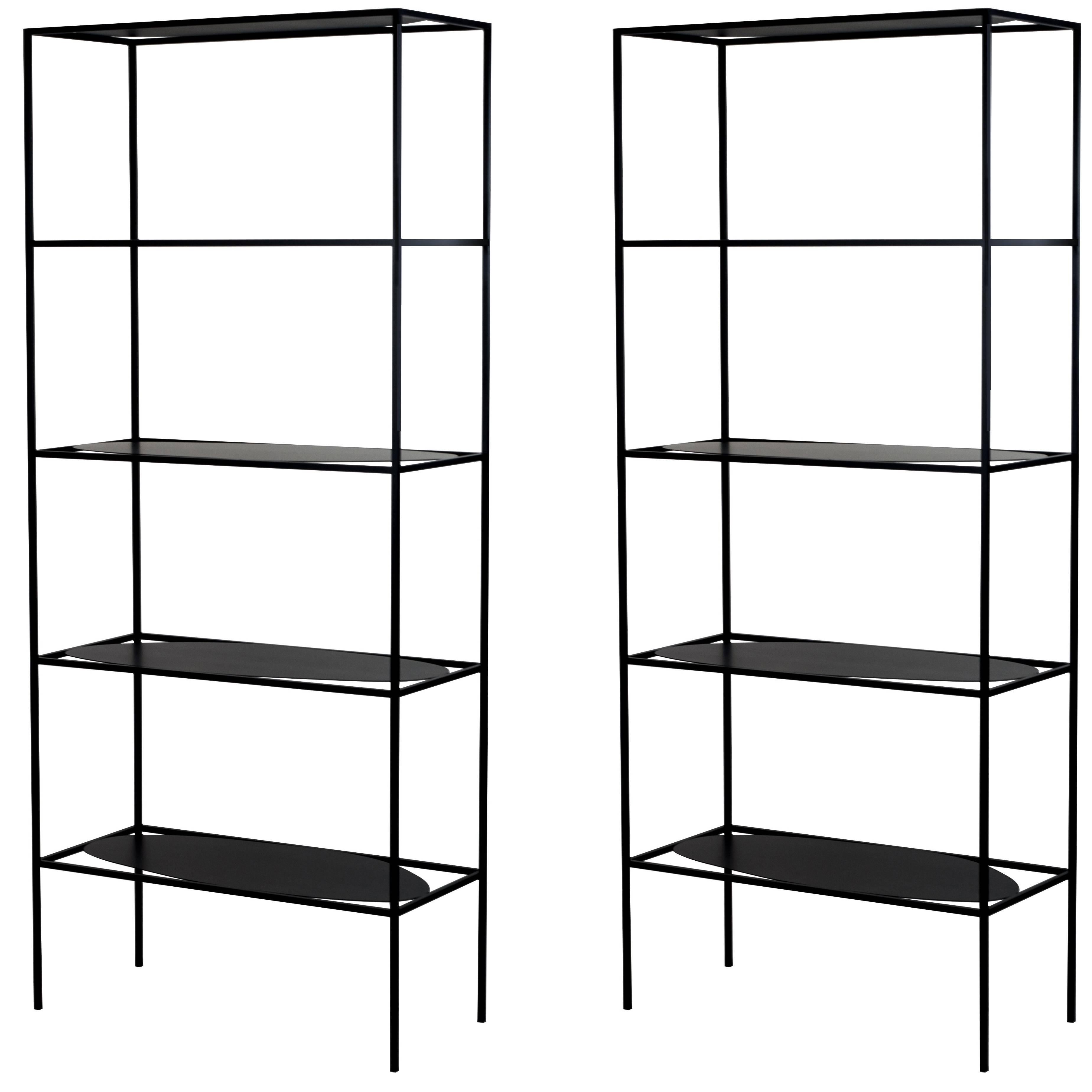 This set includes two modern Etagere bookcases Storage Shelves which are contemporary and sculptural.

The functional modern yet minimal sculptural Ahn Etagere is a study in positive and negative space. With its five different asymmetrical and