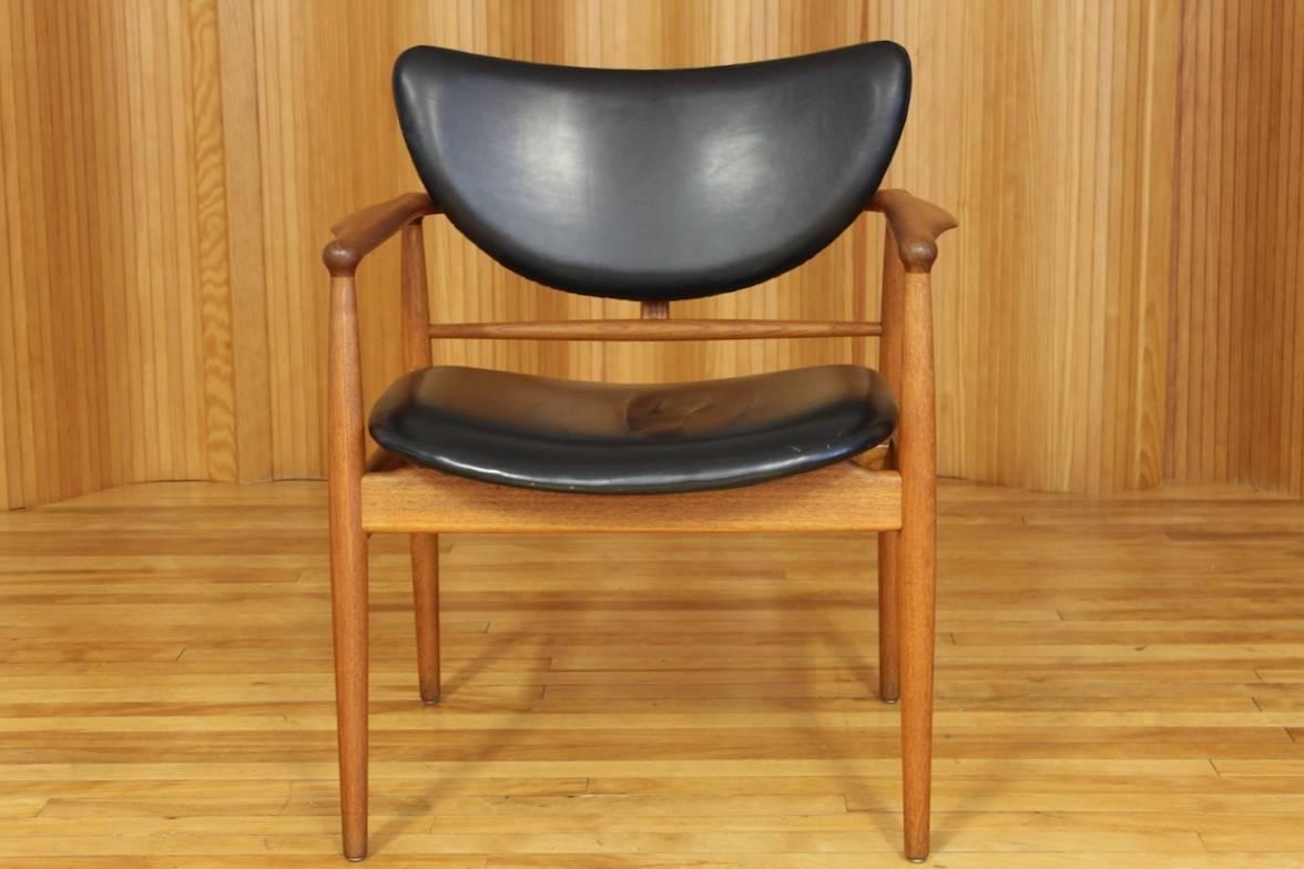 Description: Stunning and rare Finn Juhl teak armchair - model NV48. Wonderful, sculptural detailing. This is an early example manufactured by Niels Vodder Cabinetmaker, Copenhagen, Denmark, 1948.

A stunning example of this wonderful Finn Juhl