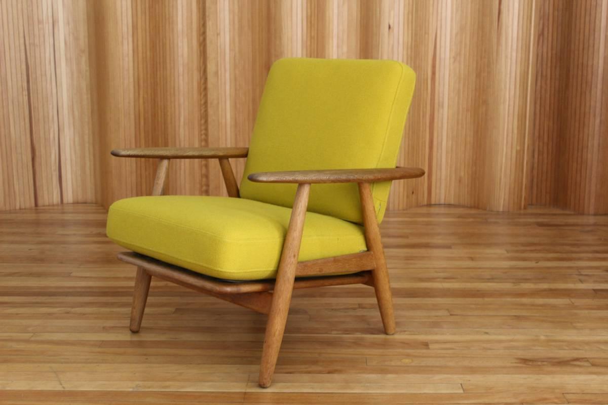 Description: Oak 'Cigar' lounge chair, model no. GE-240. 

Designer: Hans J Wegner

Manufacturer: GETAMA, Denmark

Date: 1955

Dimensions: Width 70cm; depth 78cm; height 75cm

Condition: Excellent, vintage condition. The solid oak frame