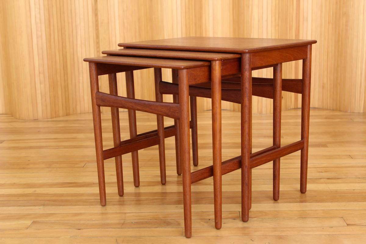 Description: Teak nest of tables - model no. AT-40

Designer: Hans J Wegner

Manufacturer: Andreas Tuck, Denmark

Date: 1950s

Dimensions: Largest table, width 52cm; depth 34cm; height 48cm

Condition: Excellent, vintage condition. The