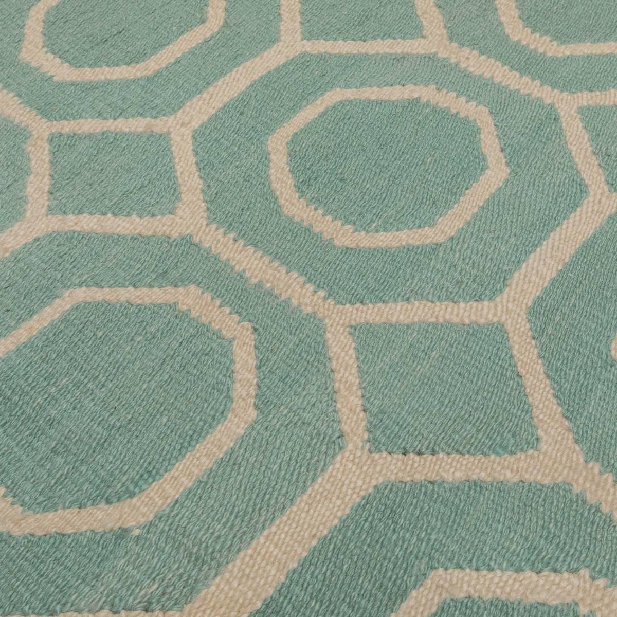 Egyptian Flatweave Rug with Geometric Desig over Green Background.