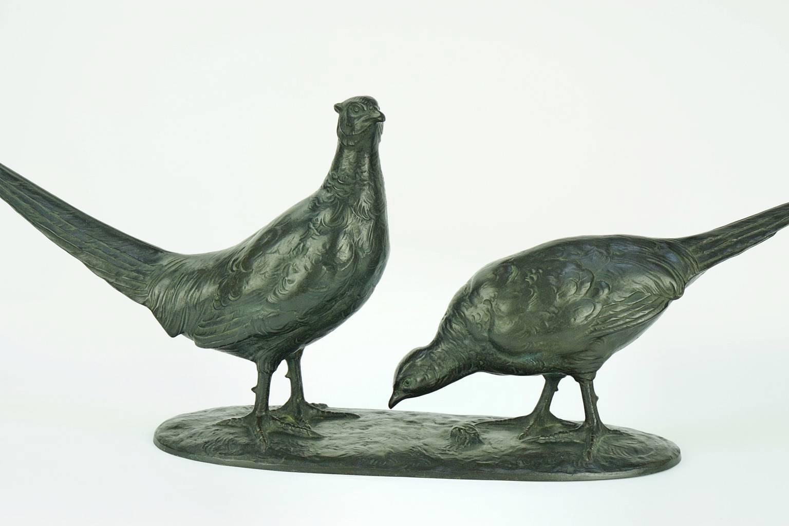 Two pheasants in courtship by Otto Poertzel (1876-1963).
Signature/marks: Prof. Poertzel. “Krass, Berlin” inscribed and foundry mark.

Very good condition.

Otto Poertzel is most famous for his chryselephantine figures. 

 
 