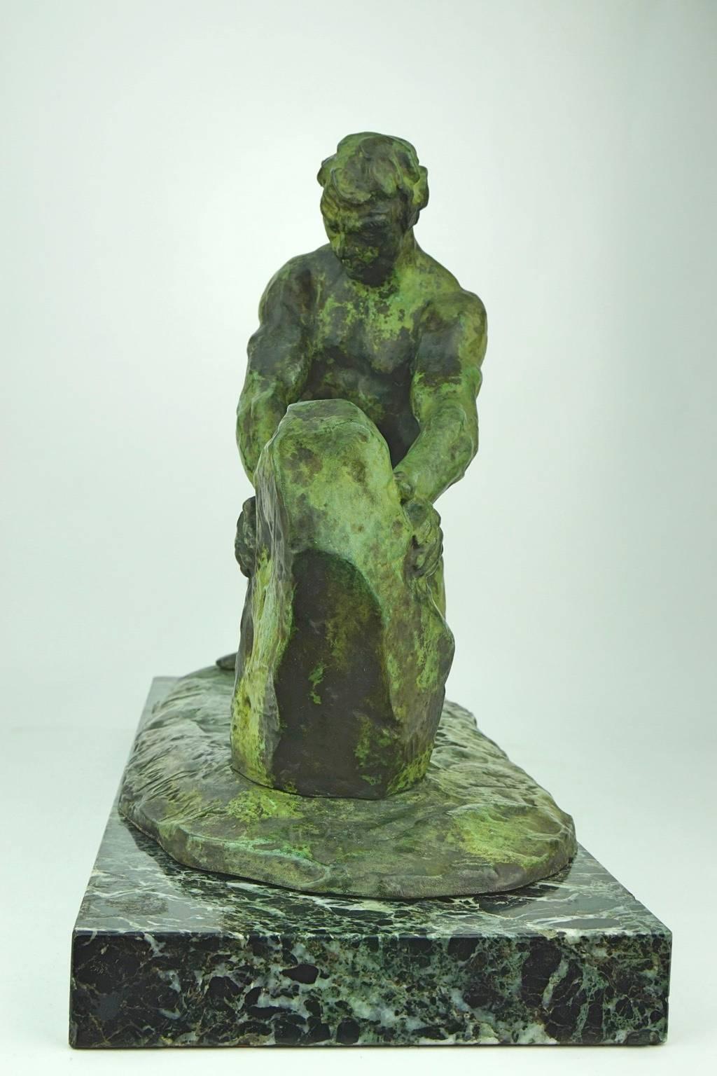 Patinated Art Deco Bronze Sculpture of a Man in Full Effort by Van Rijswijck For Sale