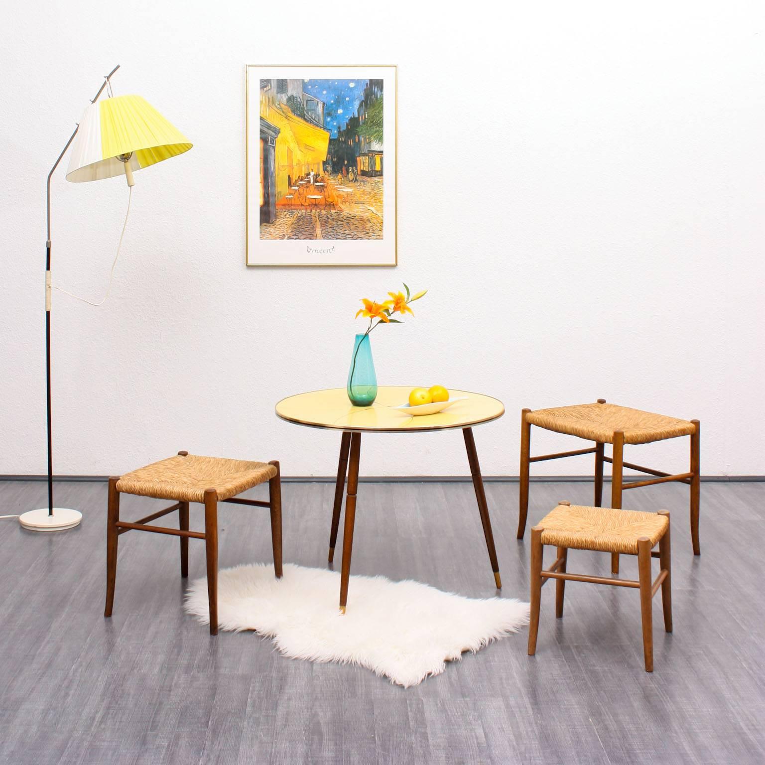 Set of three 1950s stools in various formats. Delicate solid beech frame with rushes covering. Good condition with small traces of usage.