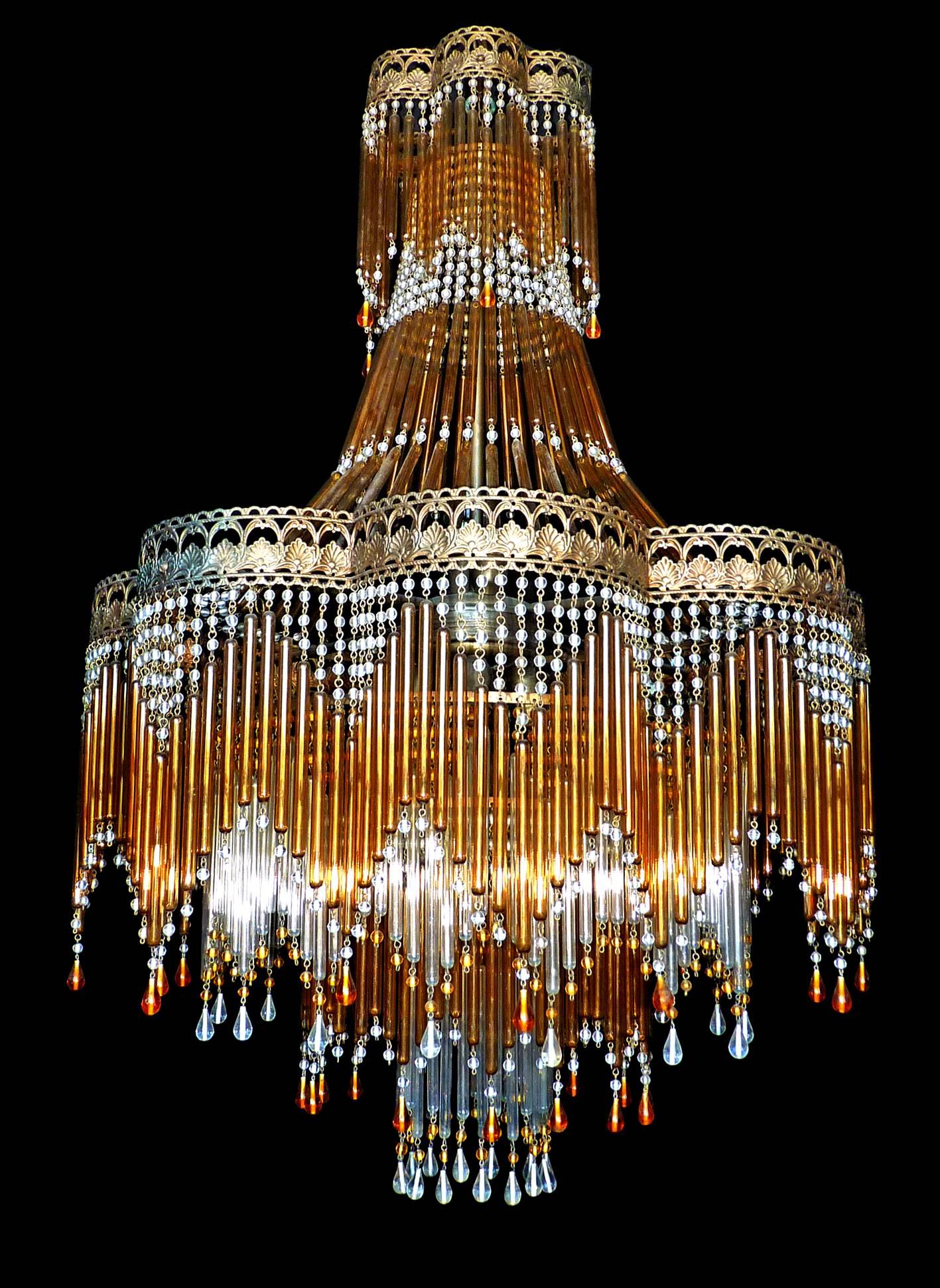 Fabulous Italian, midcentury in clear and amber Murano beaded glass Art Deco/Art Nouveau chandelier.
Measures: Diameter 52 cm
Height 95 cm.
Seven-light bulbs E14/ Good working condition/European wiring.
Age Patina
Your item will be carefully