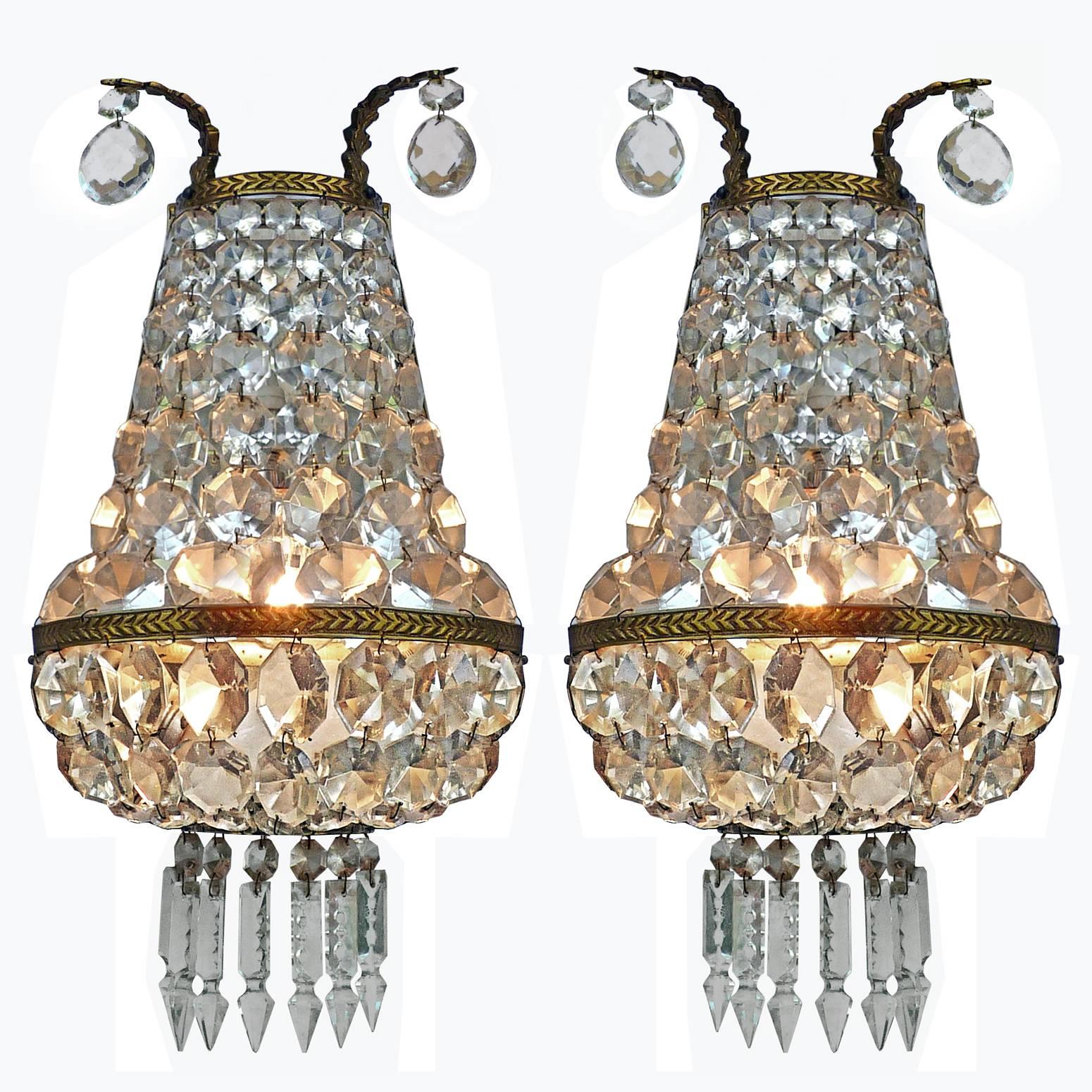 Housing two-light bulbs each E14. Bronze detailing with all crystal intact. European wiring.