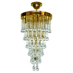 Grand lustre de style Régence hollywoodienne du milieu du siècle en cristal de Weddingcake doré en cascade