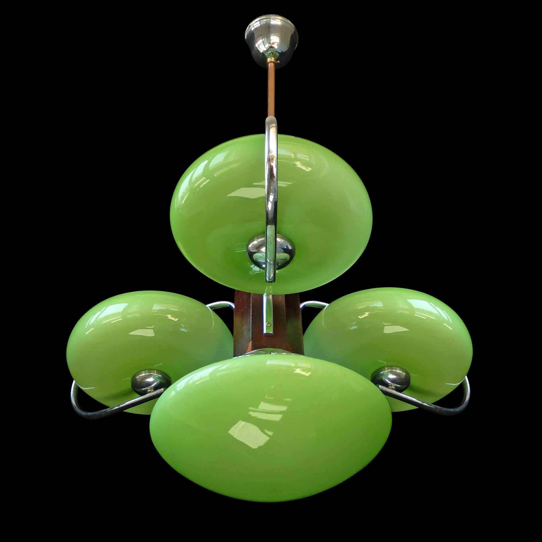 Fabulous antique French art-deco opaline green glass shades/four-light chrome chandelier
Cased glass shades/chrome/brass
Wood with minor losses as seen in pictures
Four bulbs E27/ good working condition/European wiring.