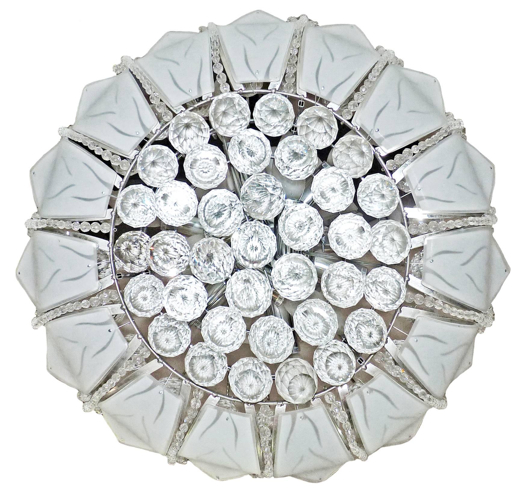 Gorgeous Hollywood Regency chandelier with double tier in crystal, chrome, frosted glass flower shades and 12 light bulbs

Measure: Diameter 24 in / 60 cm
Height 30 in / 76 cm 
Weight 24 lb. (11 kg) 
Twelve-light bulbs E14 / good working