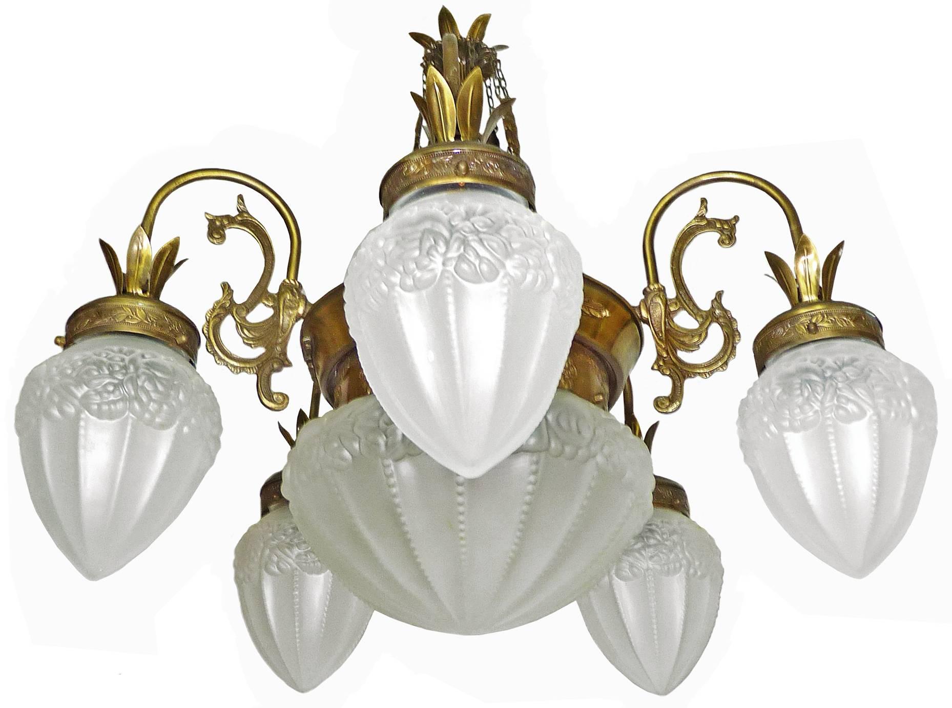 Pair of French Degué Style Art Deco White Frosted Glass, Six Light Brass Chandelier/ Gold and Bronze Color with Patina

Six bulbs (five bulbs E14 40W + one bulb E27 60W)

Good working condition / European rewired

Diameter: 28.5 in / 72 cm

Height: