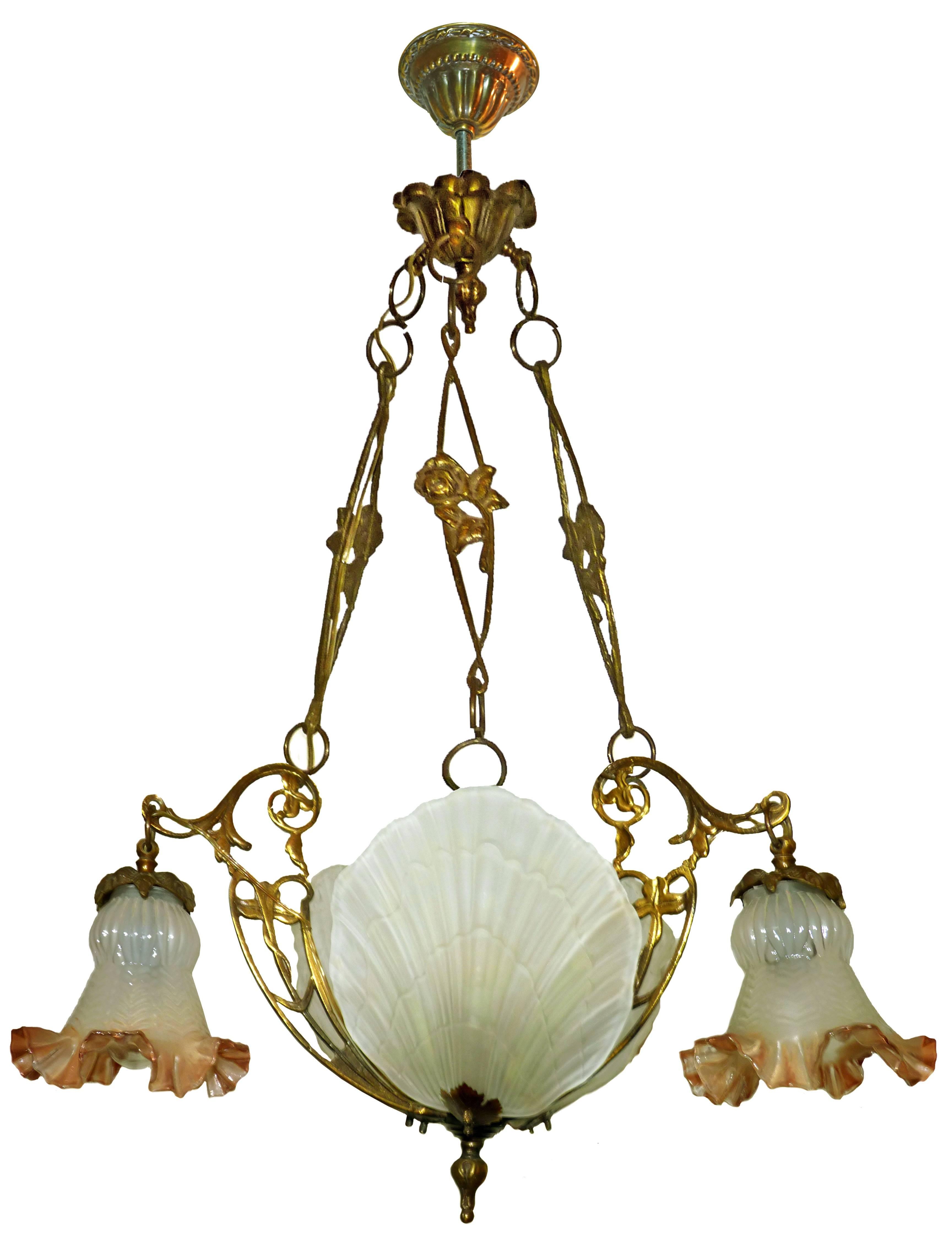 French Art Nouveau /Art Deco chandelier in bronze and frosted glass shades.
Measures: 
Diameter 24 in/ 60 cm
Height 30 in/ 75 cm
Weight 6 Kg / 13 lb
Four-light bulbs (3 / E14 + 1 / E27/ good working condition/European wiring.
Also have