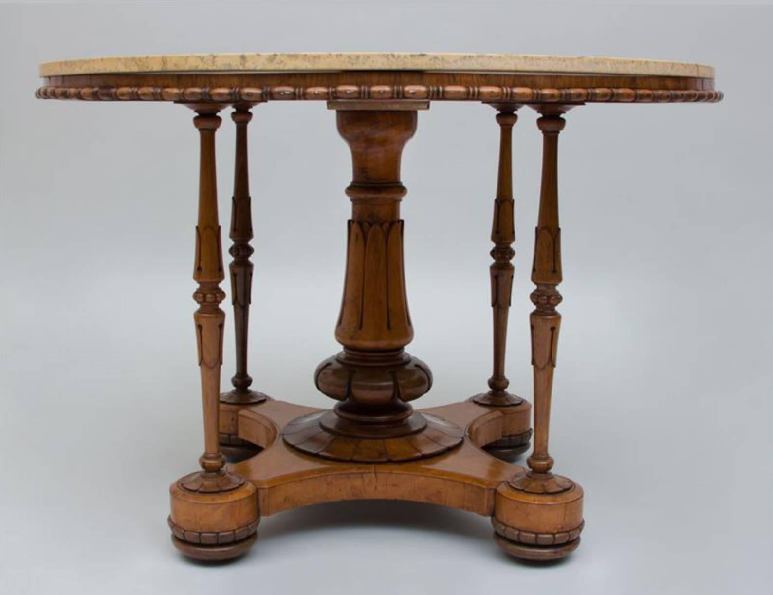 A fine English William IV
Carved bird's-eye maple and rosewood centre table,
circa 1835

Fitted with a inlaid scagliola top.
 
measure: Height 29 in x diameter 42 in.  

Provenance:
Property from a Private Greenwich, CT Collector 
Le