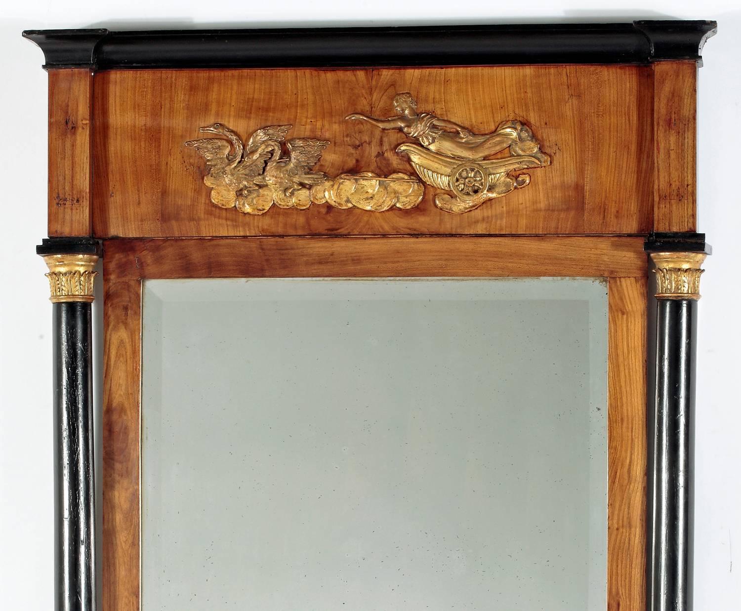 A Fruitwood & Ebonized Parcel Gilt 
Neoclassical Pier Mirror
Circa 1800

Height 67 in.  Width 33 in.

Provenance:
Property of a Gentleman Boston Ma.

Mir30