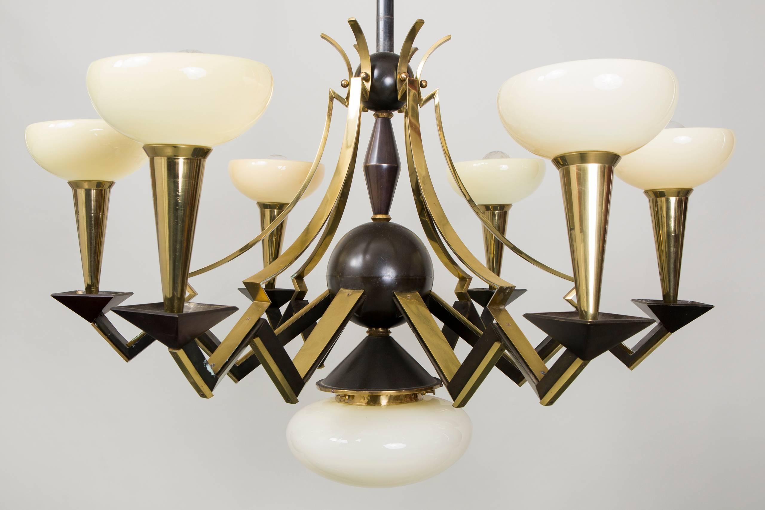 Cubist style chandelier by architect Josef Gočár.
Original perfect condition. 
Rare design.

We guarantee safe a the cheapest air transport from Europe to the whole world within 7 days.
The price is the same as for ship transport but delivery time