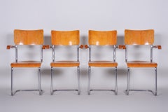 Lot de quatre fauteuils Bauhaus restaurés, de la marque Vichr a Spol., en hêtre, République tchèque, années 1930