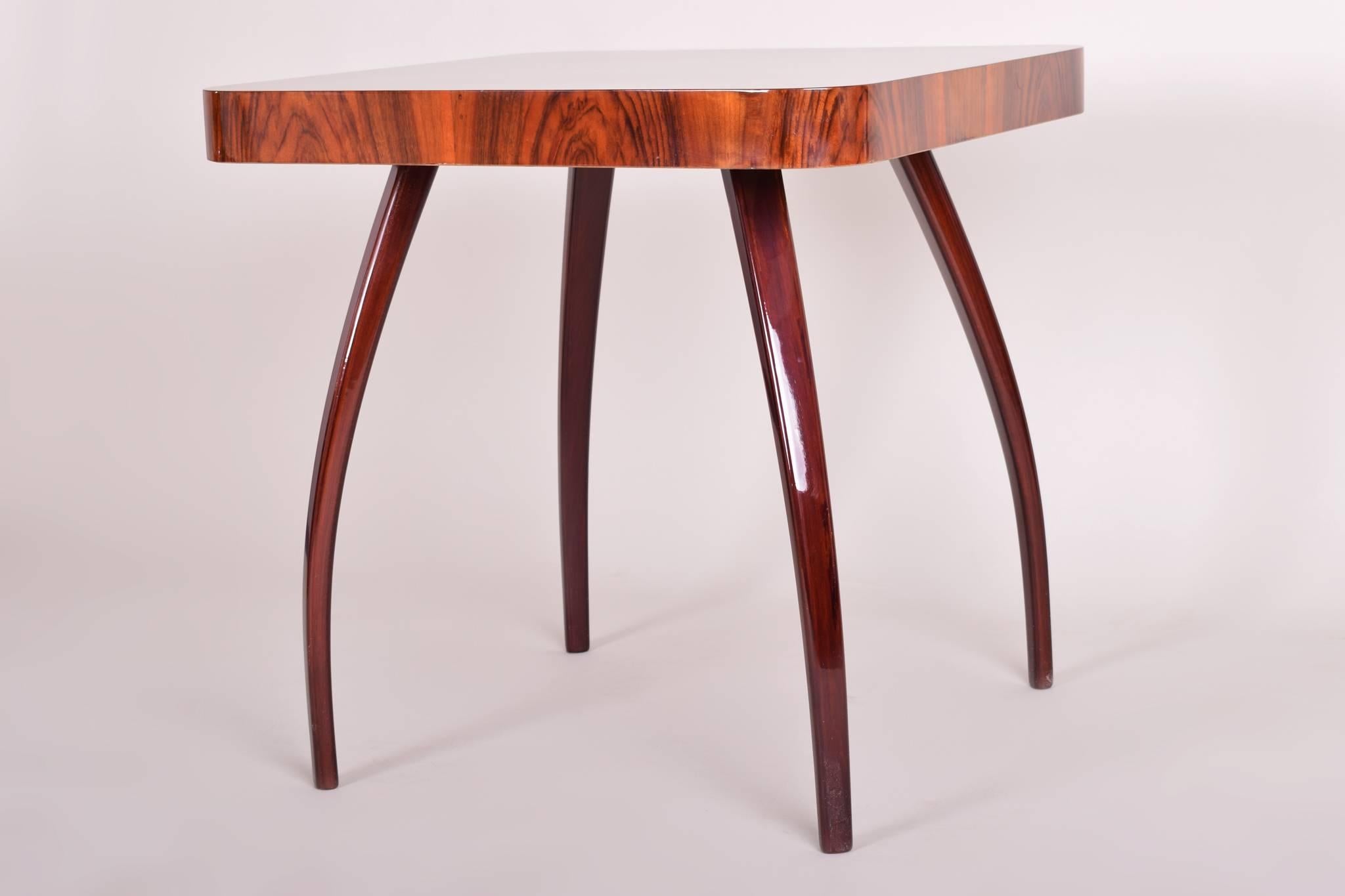 Artdeco table.
Completely restored. 
Walnut veneer. 

We guarantee safe a the cheapest air transport from Europe to the whole world within 7 days.
The price is the same as for ship transport but delivery time is really shorter.
We create a special