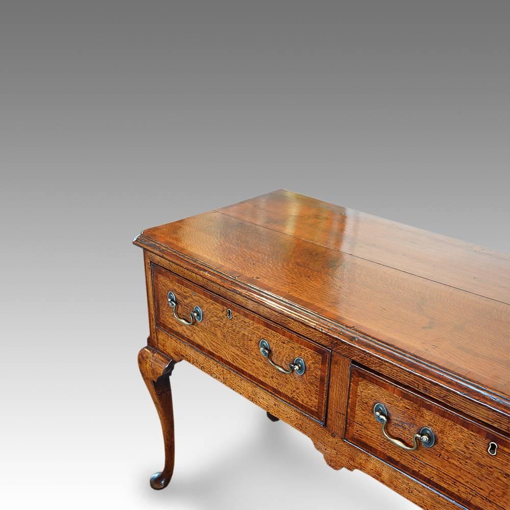 George III cabriole leg dresser
Here we have this wonderful dresser base standing on elegant cabriole legs.
This would have been made in the North Country, probably Lancashire.
The dresser fitted three drawers with brass swan neck drop