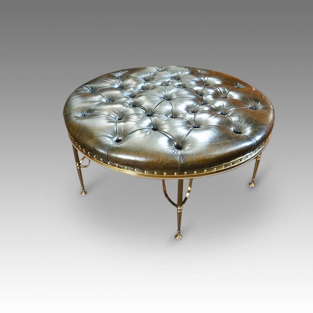 Circular leather stool on brass stand
Here we have this large circular buttoned leather stool on a brass legged stand.
This coffee table and stool, makes a wonderful conversation piece. It would look fantastic is so many areas in the home, or even
