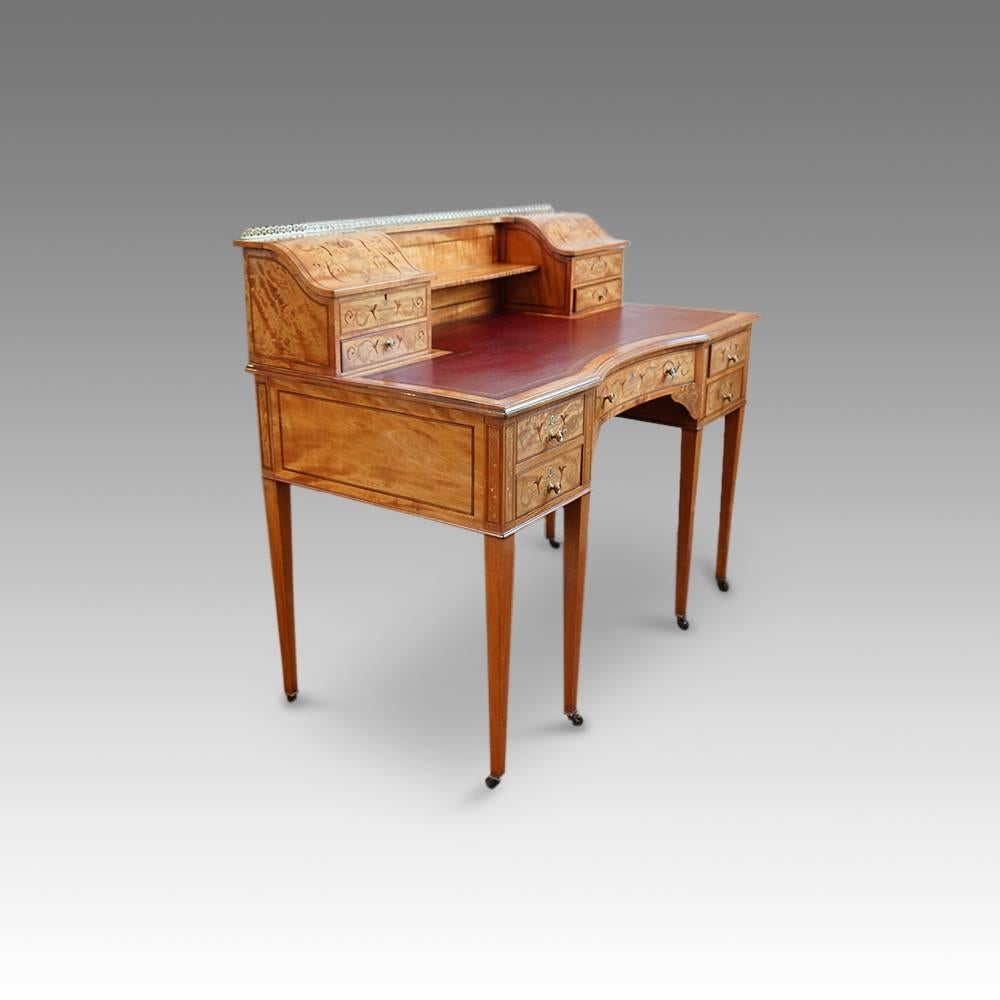 Edwardian inlaid satinwood desk
Here we have this Edwardian desk made in inlaid satinwood.
These desks are commonly known as bonheur du jour (good hour of the day) desks
The top with a marvellous superstructure, consisting of a pair of lidded