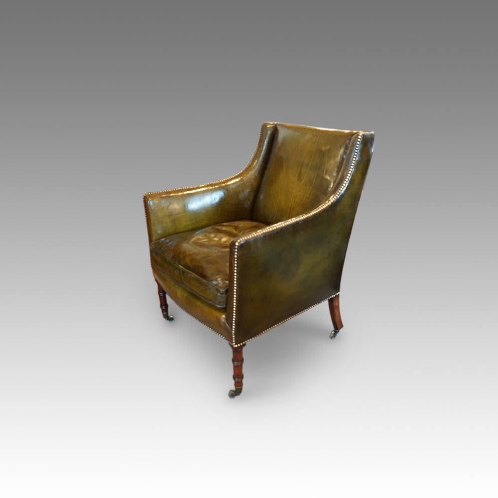 Regency mahogany leather library chair
Here we have a Regency mahogany chair upholstered in antiqued green leather.
This lovely chair stands on finely ring turned legs and the original rolling.
We have upholstered this chair in fine leather,