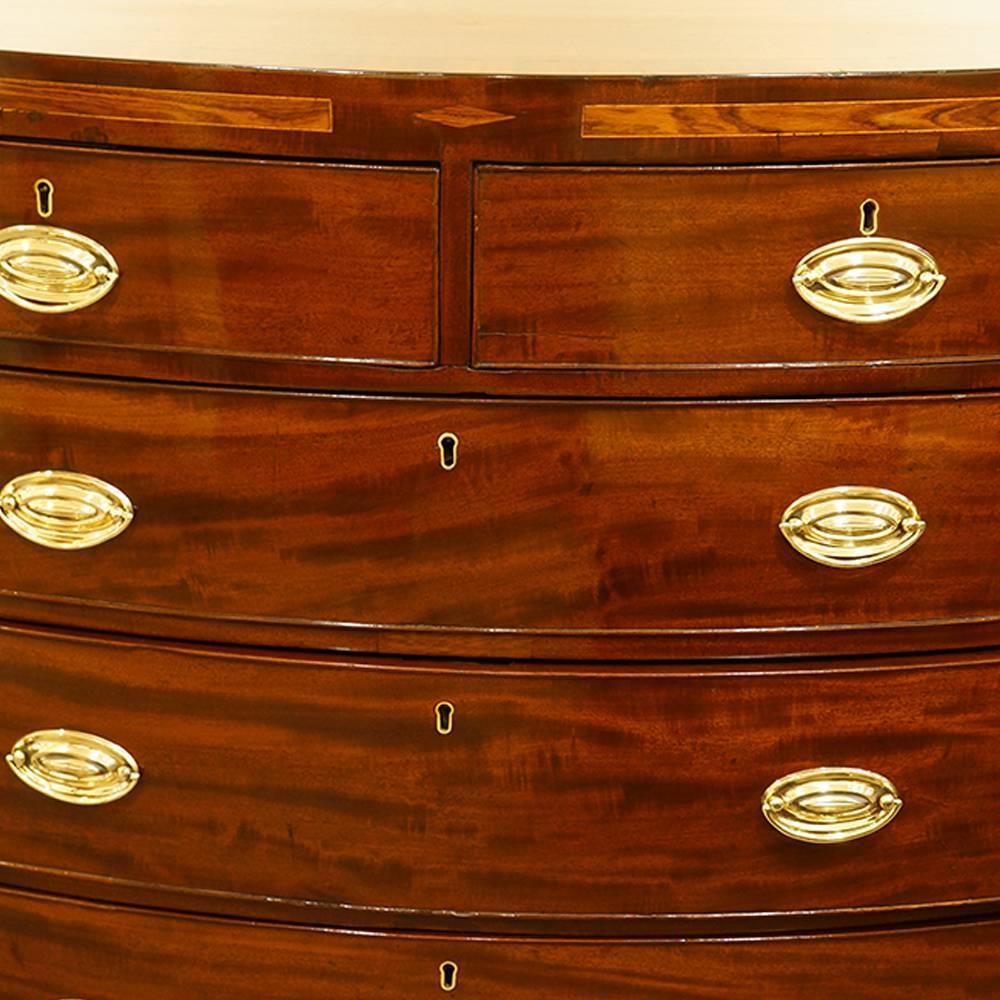 Georgian mahogany bow-front chest

Georgian chest of drawers made circa 1820, that is fitted four rows of graduated oak lined drawers and oval brass swing handles.
The chest which is bow-fronted, stands on elegant splay feet joined by a shaped