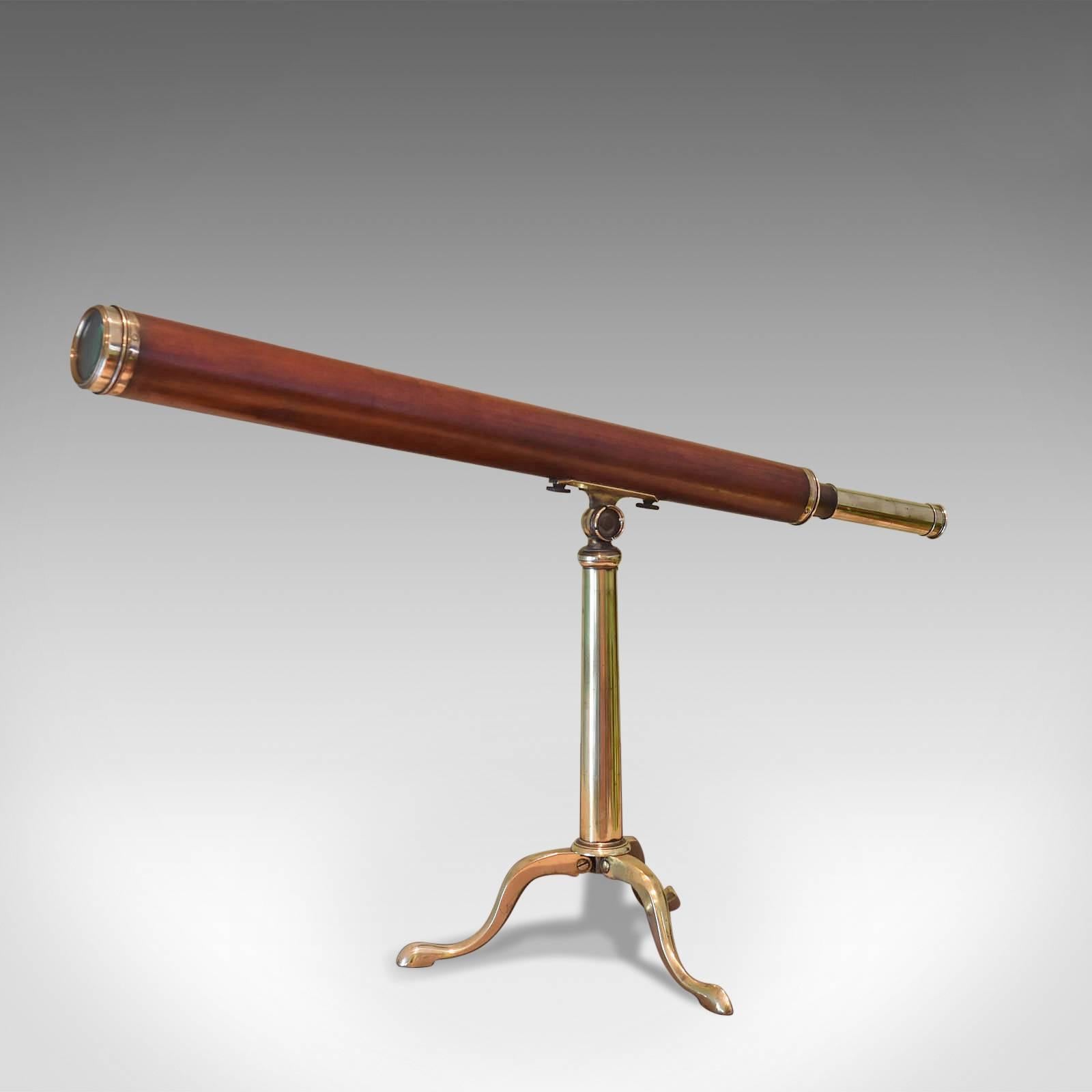 This is an antique Dollond, achromatic library telescope, circa 1790.

Mounted on a solid brass tripod stand with cabriole legs and spade feet the mount allows fluid movement in both the horizontal and vertical planes.

The telescope consists of