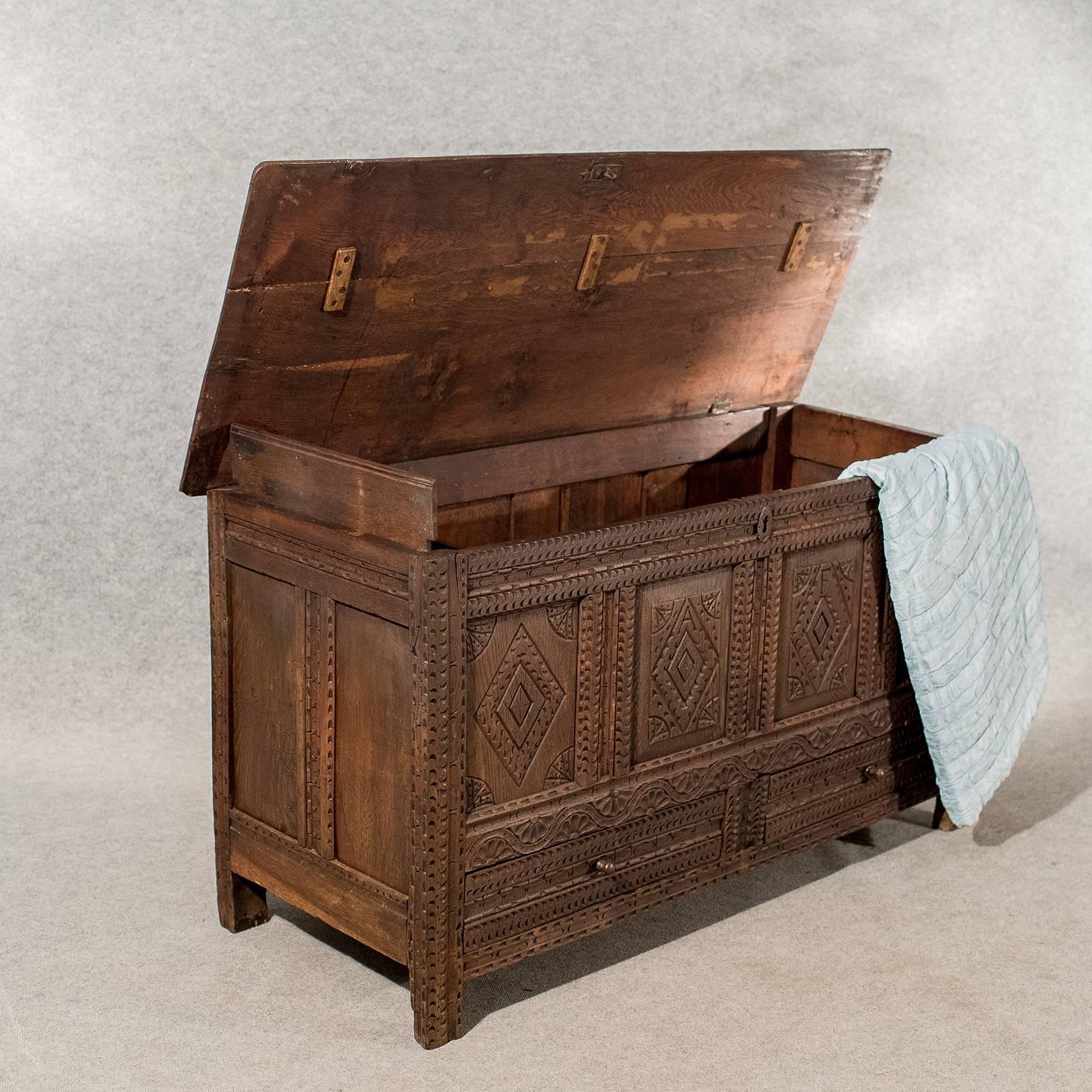 A very pleasing original coffer chest presented in good antique condition
Usefully sized and offering practicality with classic antique charm
Of interest displaying quality geometric hand-carved detail throughout and showing the letters A & F to