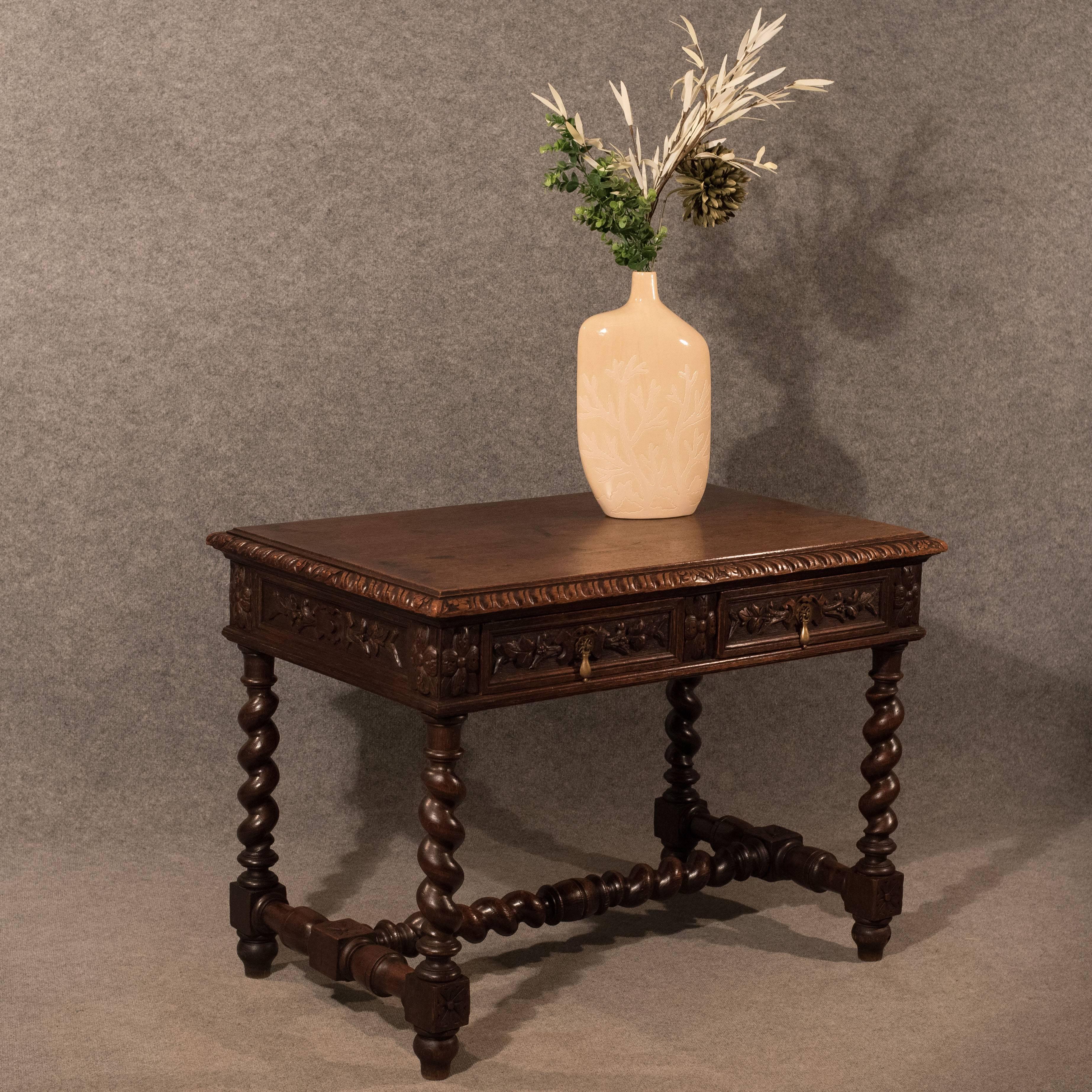 A very pleasing English oak desk table presented in good antique condition
Original Victorian, circa 1870
Displaying superb fat barley twist legs set in mirrored opposition and united by a barley twist stretcher
Solid quality oak delivering a