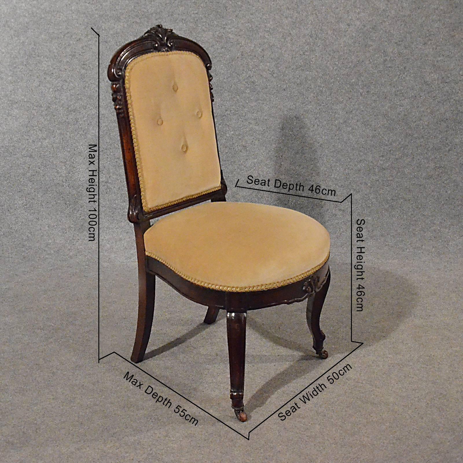 A quality set of four English late Victorian dining chairs in good antique condition
Wide, sprung seats and upholstered back make these a very comfortable chair
Desirable button-back with interesting carved header crown
Well executed curved front