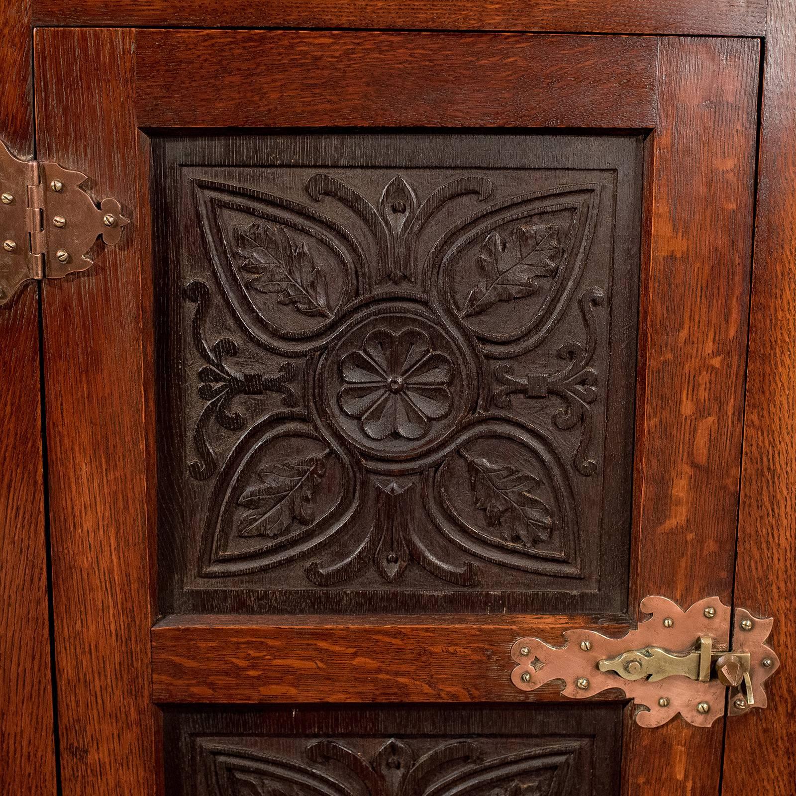 Arts and Crafts Oak Carved Corner Cabinet Cupboard Arts & Crafts Copper Hinging, circa 1900