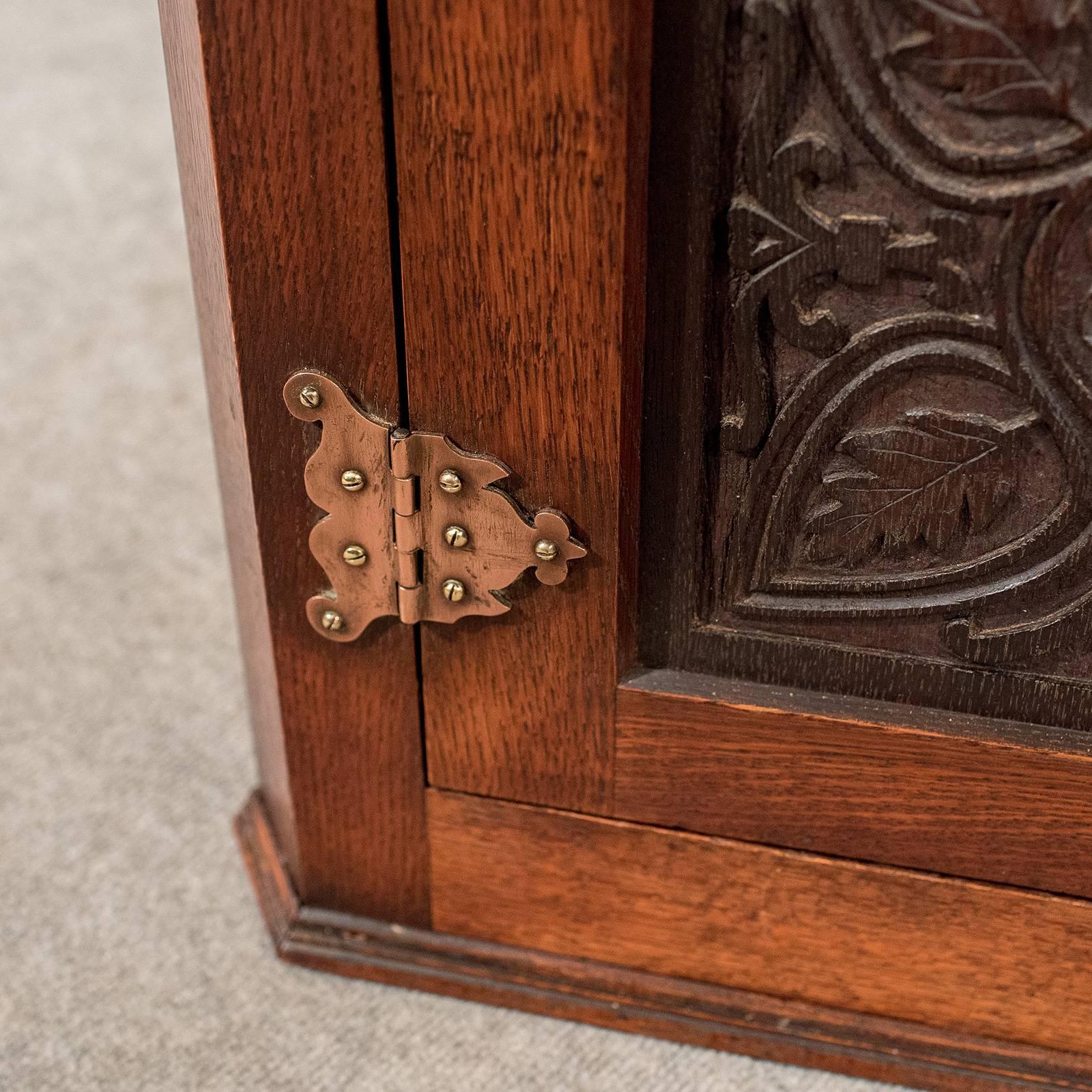 Early 20th Century Oak Carved Corner Cabinet Cupboard Arts & Crafts Copper Hinging, circa 1900