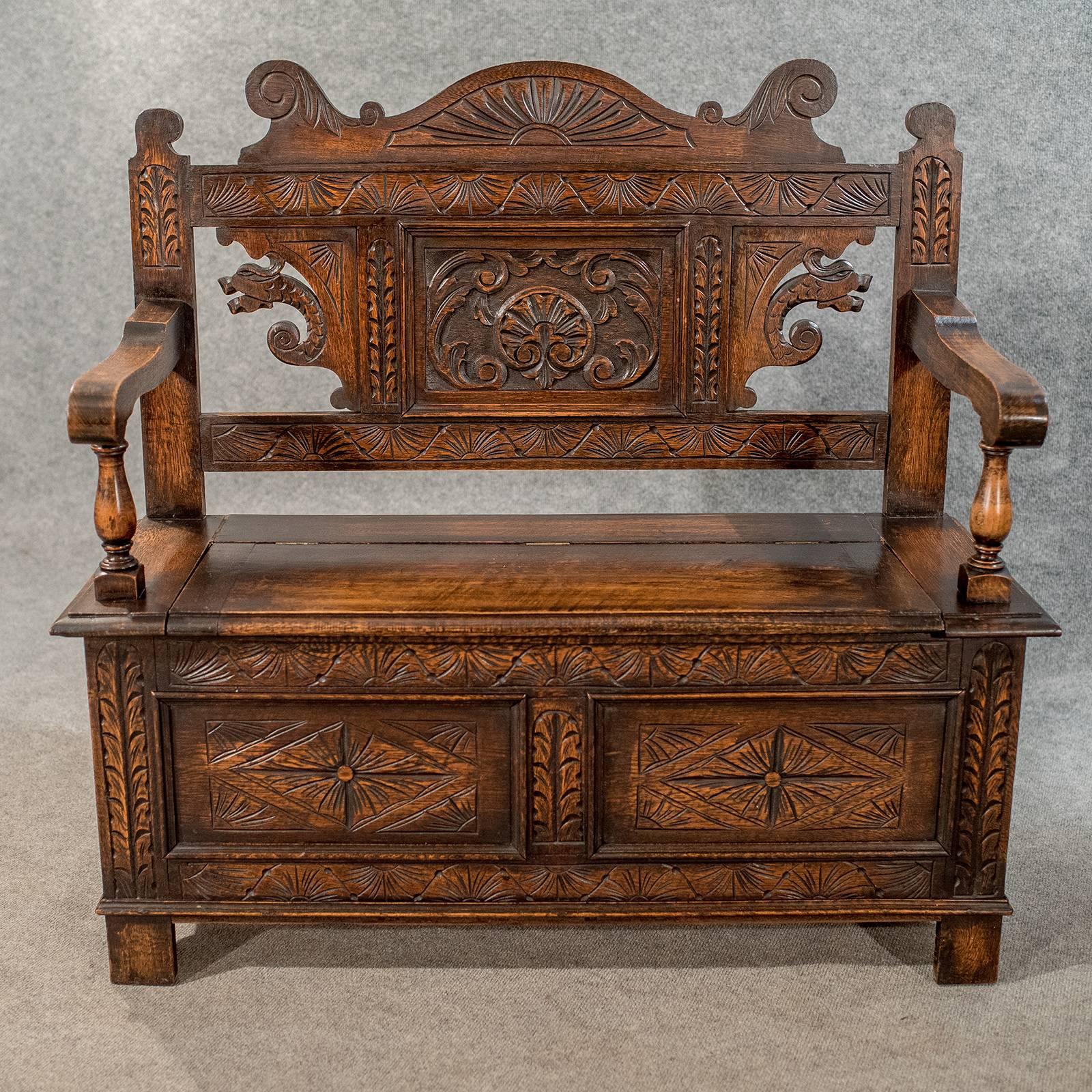 Carved Oak Settle Bench Pew Hall Seat with Locker, English, Mid-20th Century In Good Condition In Hele, Devon, GB