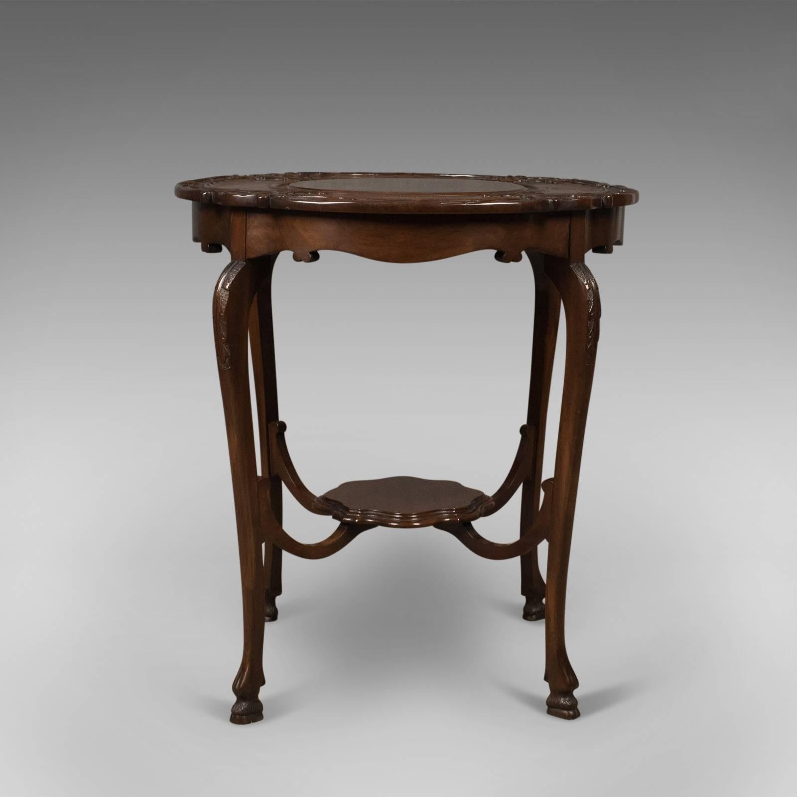 This is an antique display table, a Victorian mahogany side or lamp table, English, circa 1880.

Fine table in choice mahogany with interest from every angle
Raised on long sinuous cabriole legs with carved knee detail
Standing upon unusual,