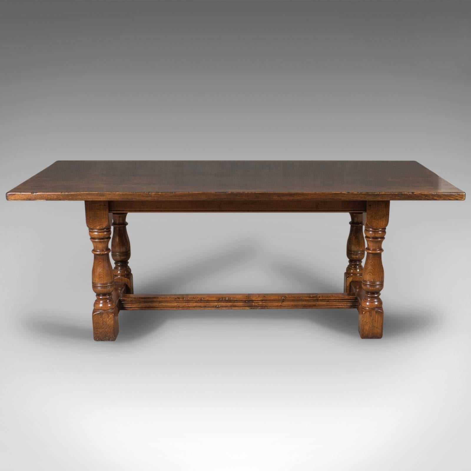 This is a superior quality, six-eight-seat oak refectory table in the 17th century taste made in the late 20th century.

Substantial English oak with good grain detail 
Planked top in a very robust 3.25cm (1.25'') thick stock
Aged beneath a