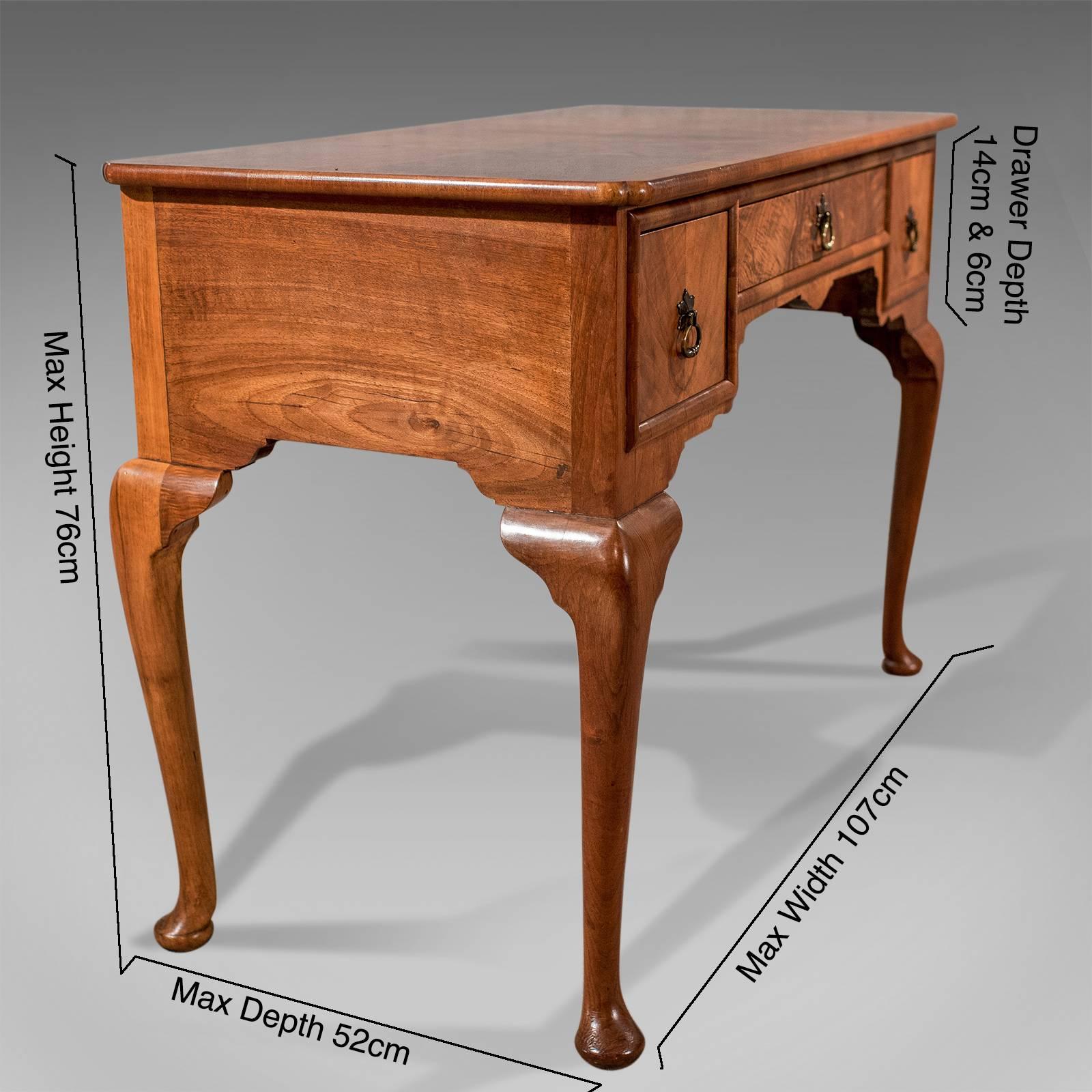 A most pleasing writing desk presented in excellent antique condition
Displaying fabulous burr walnut veneer
Delightfully dressed with original quality cast brass handles
Offering practical and attractive use as a desk or a side table
Rising