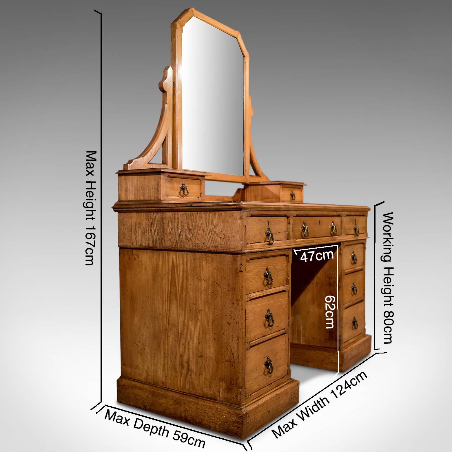 A most pleasing vanity dressing table presented in good antique condition
With Classic Gothic over tones to this well crafted item of functional furniture
Delightfully dressed with original quality cast handles showing ecclesiastical Gothic