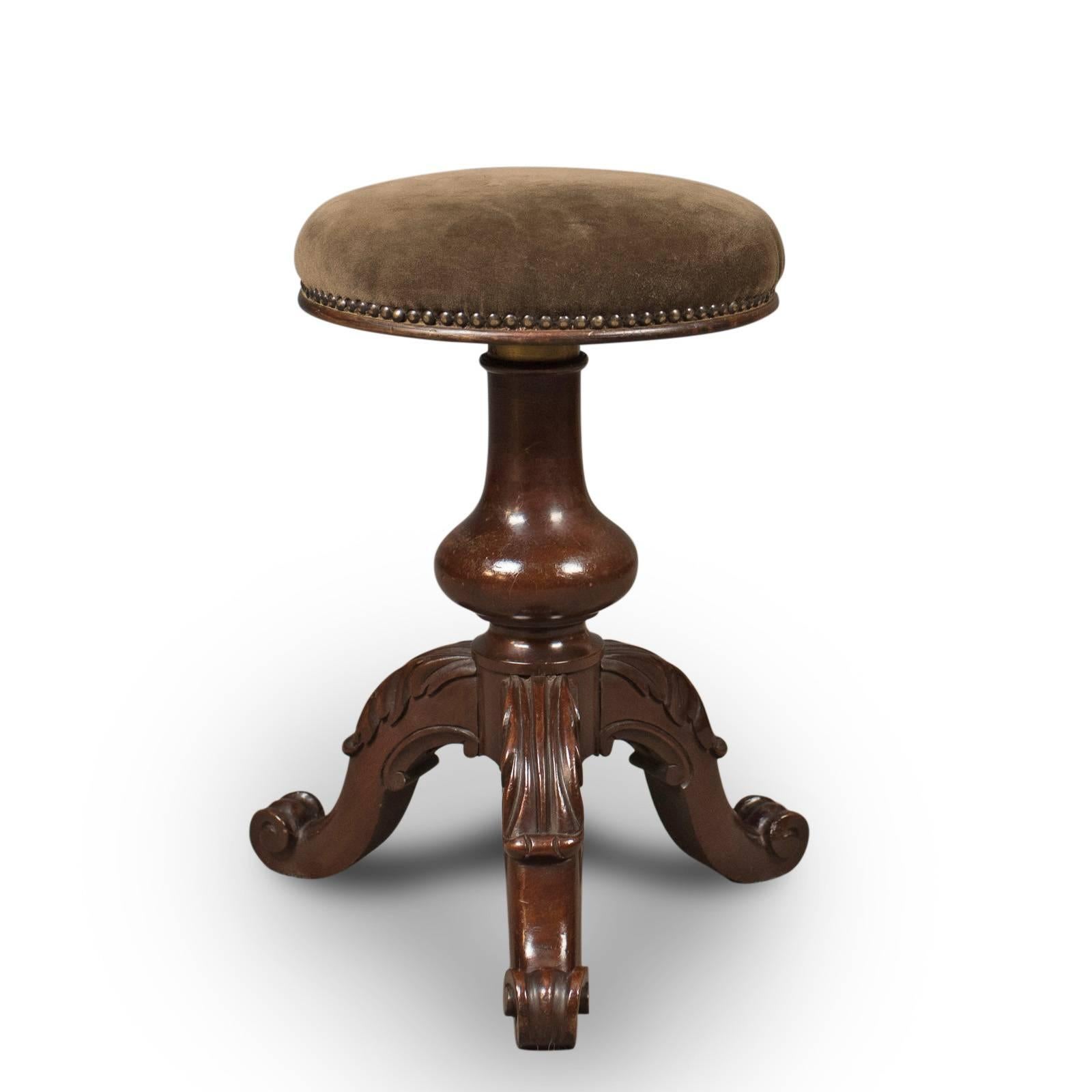 This is an adjustable, antique piano stool in mahogany, Victorian, dating to the latter part of the 19th century, English, circa 1880.

Beautifully made in solid mahogany with a waxed finish and desirable aged patina
Raised on a tripod of