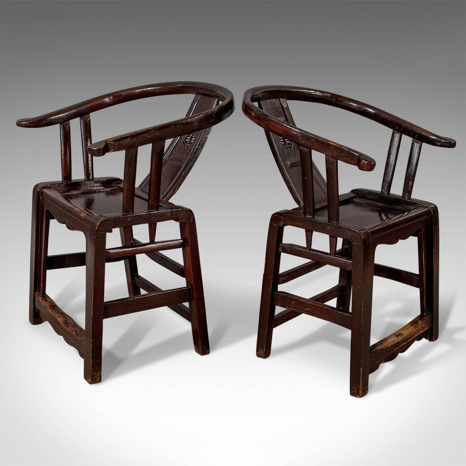 Qing Pair of Chinese Oriental Asian Carver Elbow Horseshoe Armchairs, circa 1890