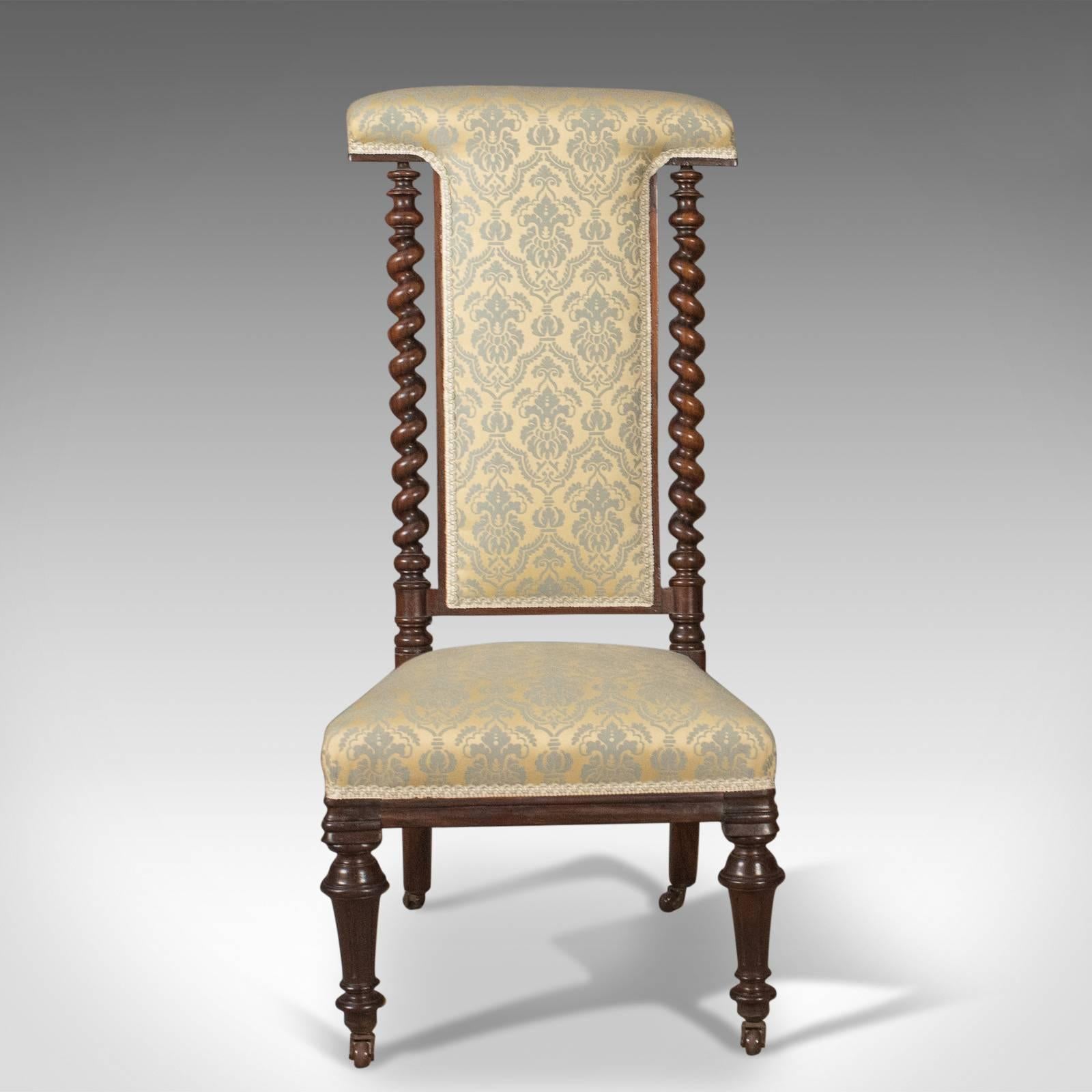 This is a Victorian, antique chair, a 19th century prie dieu in rosewood ideal as a bedroom side chair and dating to circa 1870.

Crafted in rosewood with the most glorious grain detail in the lustrous polished finish
Raised upon fluted, turned